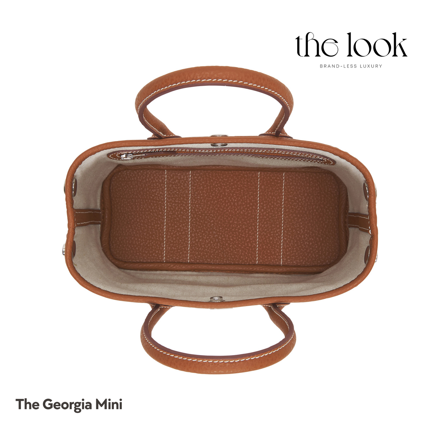 Open view of Georgia Mini Tote in Gold Tan Pebbled Calfskin Leather with zipper pocket