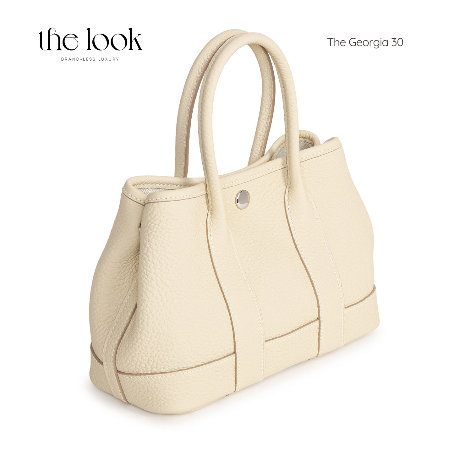 Georgia Medium Tote in cream pebbled calfskin leather, showcasing refined design and elegant stitching.