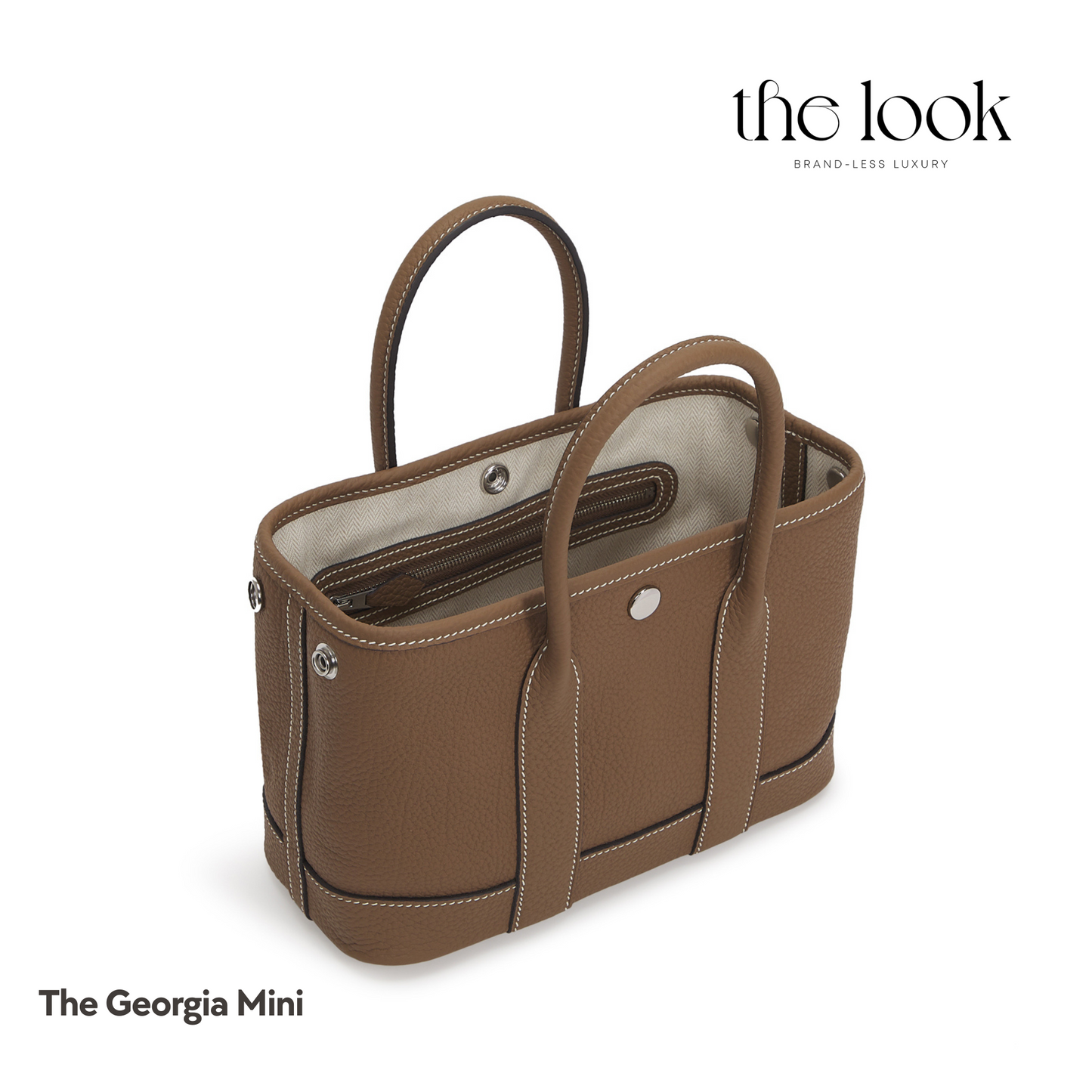 Open view of The Georgia Mini Tote in Etoupe leather showing zipper pocket and compartments