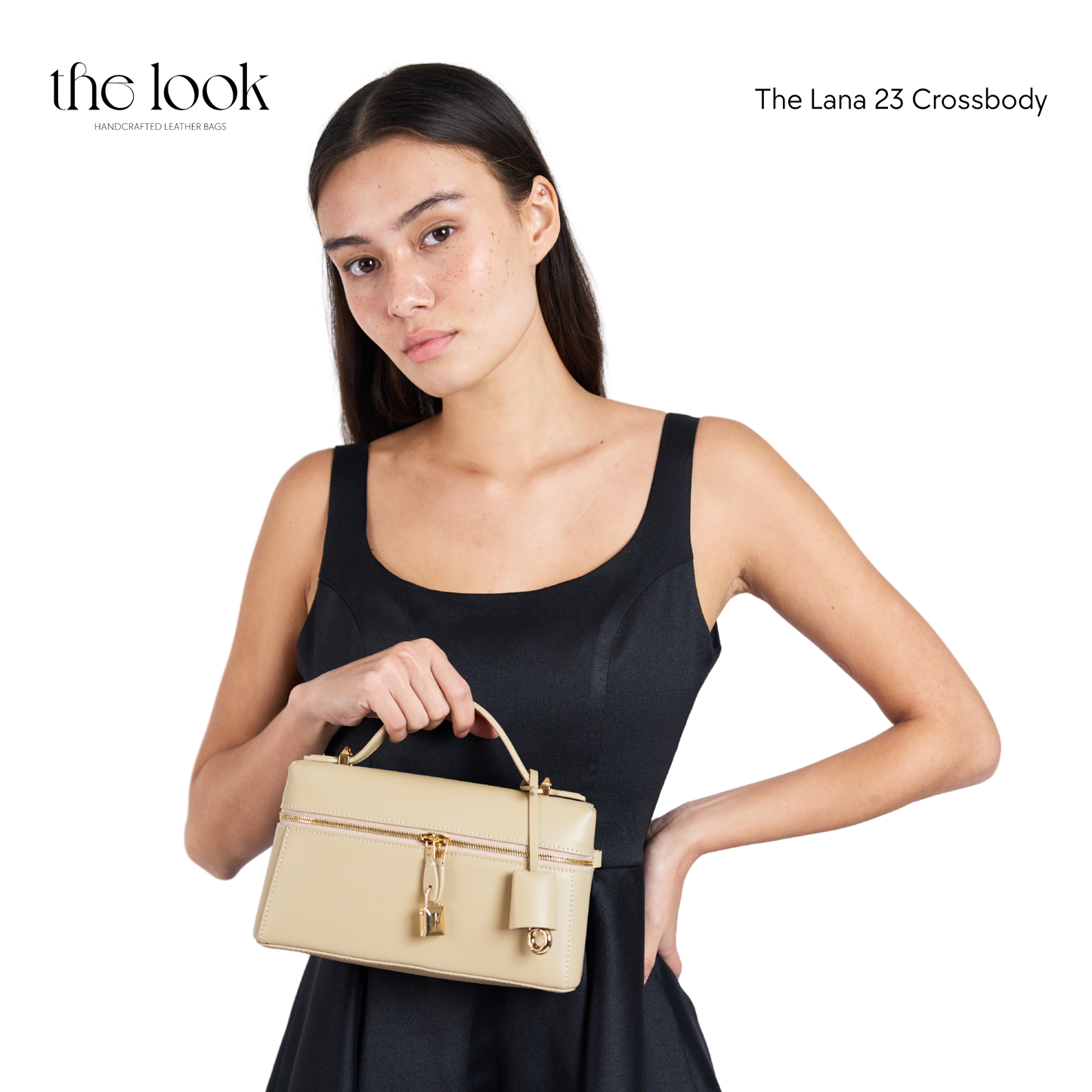 Woman holding a beige handbag with 'the look' branding on a white background | The Look Officiel