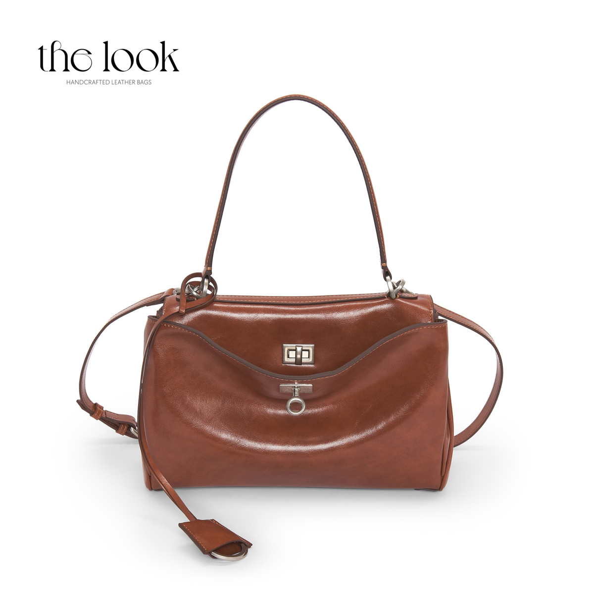 Valen Medium Satchel in Caramel, close-up of front closure, stitching and silver-tone hardware | The Look Officiel