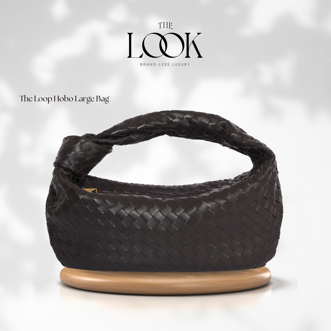 Convertible leather bag styled as a crossbody, shoulder bag, and clutch from The Look Officiel