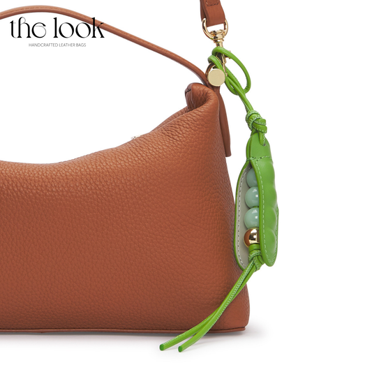Green Peas Leather Bag Charm on Gold Tan Handbag | The Look Officiel