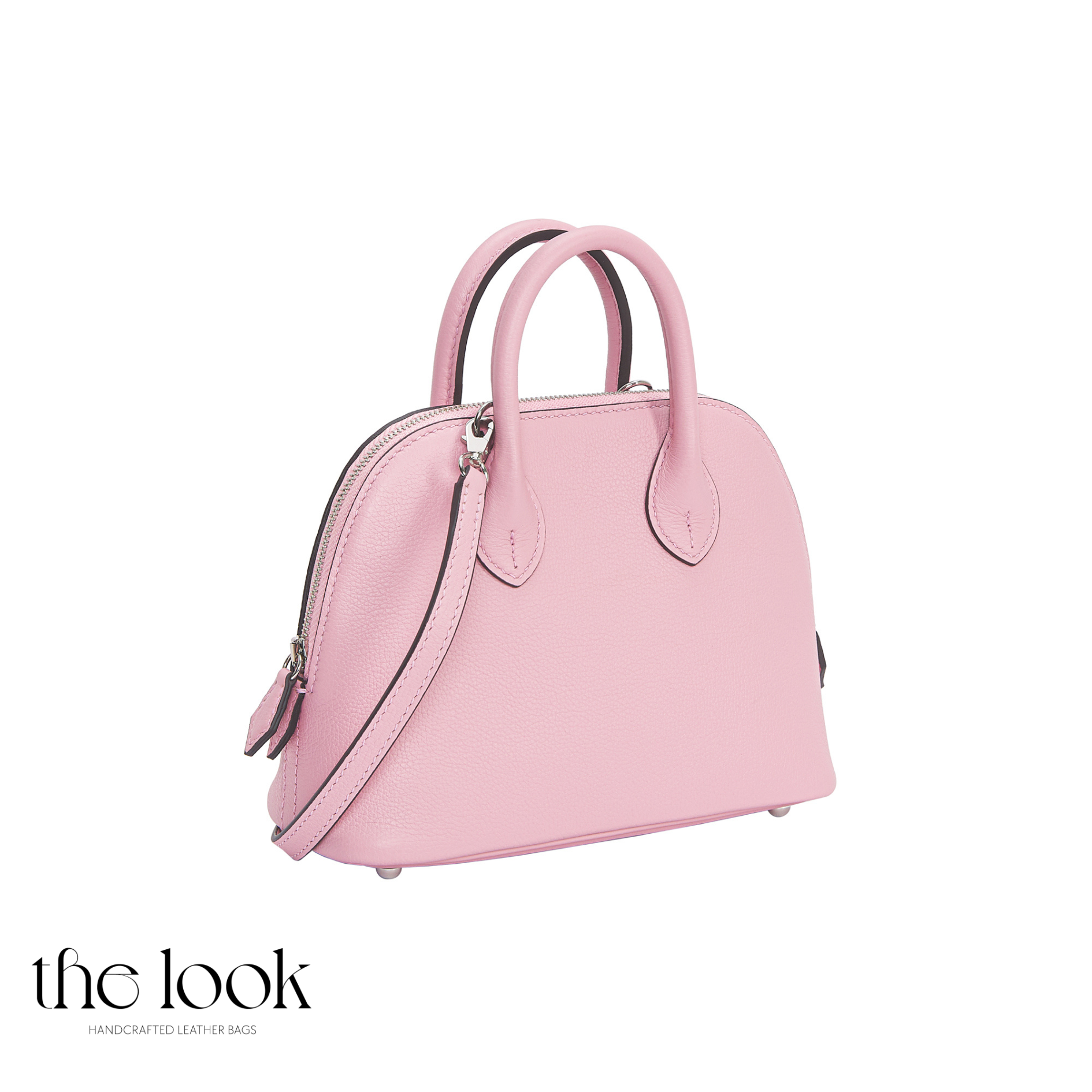 Pink handbag on a white background with 'the look' branding.| The Look Officiel
