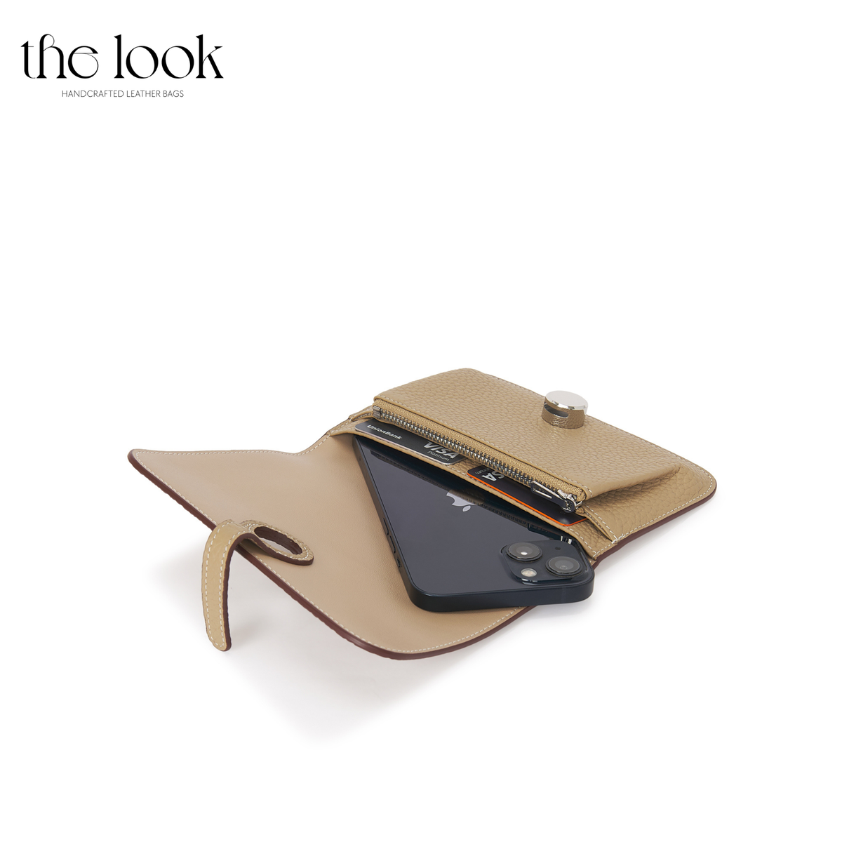 Cleo Small Wallet in Biscuit top-grain pebbled calfskin leather with stainless steel silver hardware, opened with cards and phone shown inside
