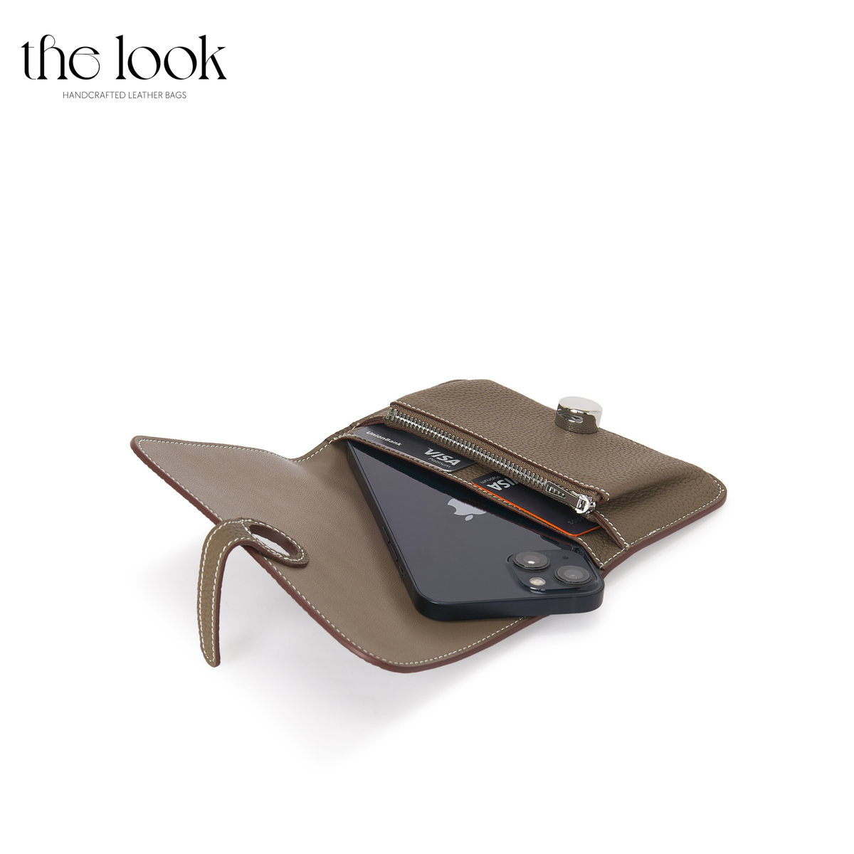 Cleo Small Wallet in Etoupe top-grain pebbled calfskin leather with stainless steel silver hardware, opened with cards and phone shown inside