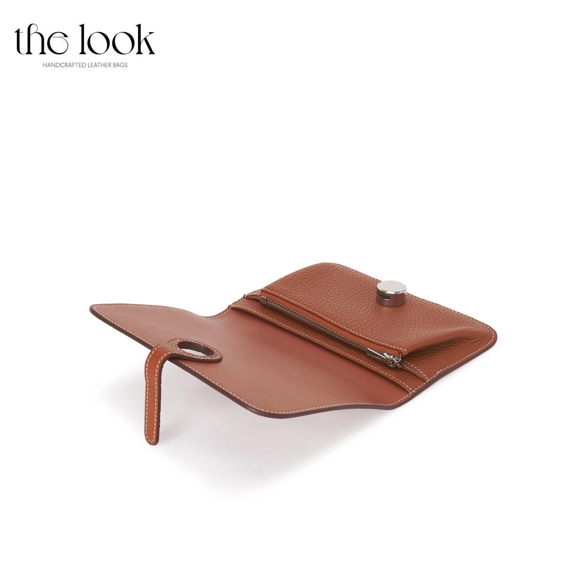 Cleo Small Wallet in Gold Tan top-grain pebbled calfskin leather with stainless steel silver hardware, opened at an angle showing interior organization