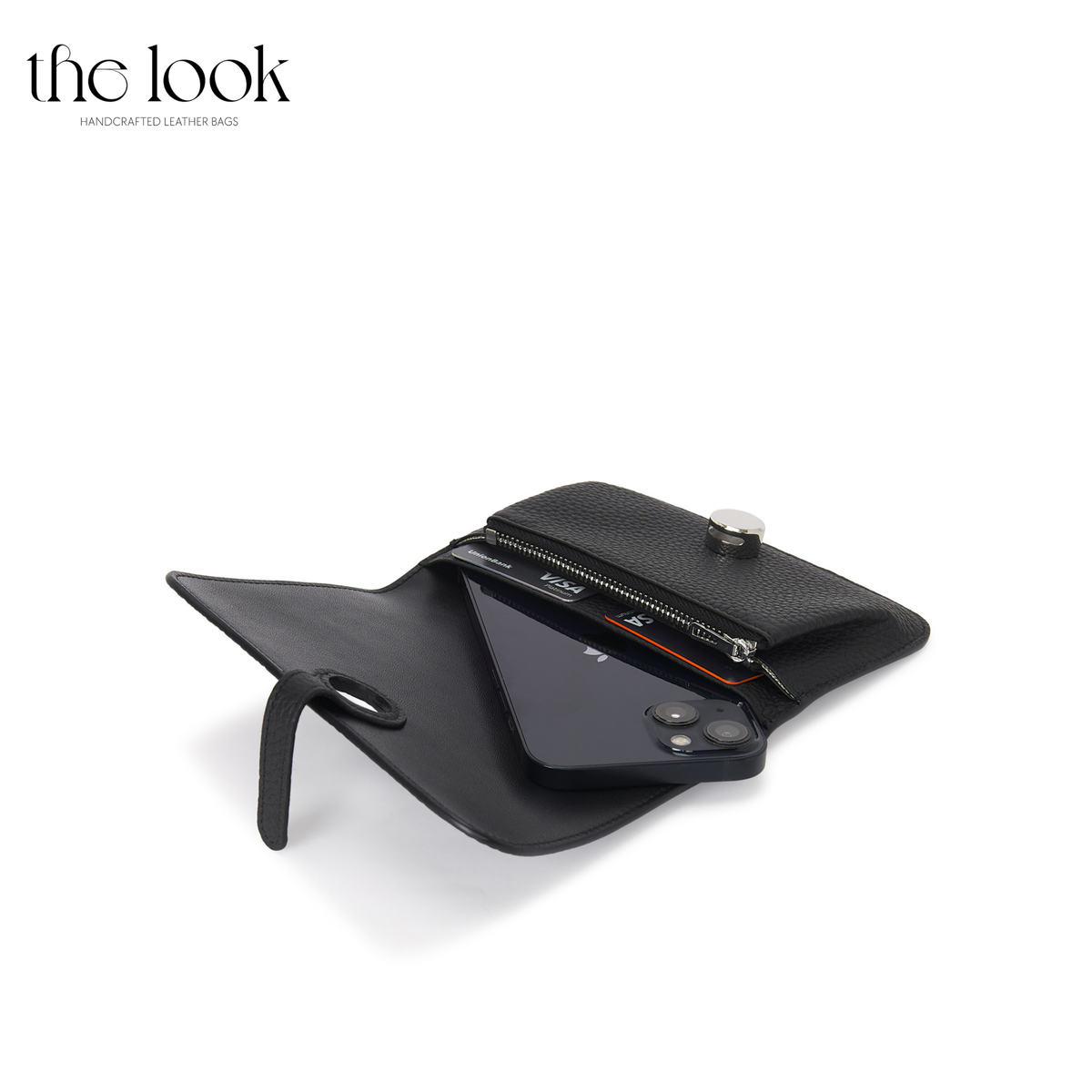 Cleo Small Wallet in Black top-grain pebbled calfskin leather with stainless steel silver hardware, opened with cards and phone shown inside