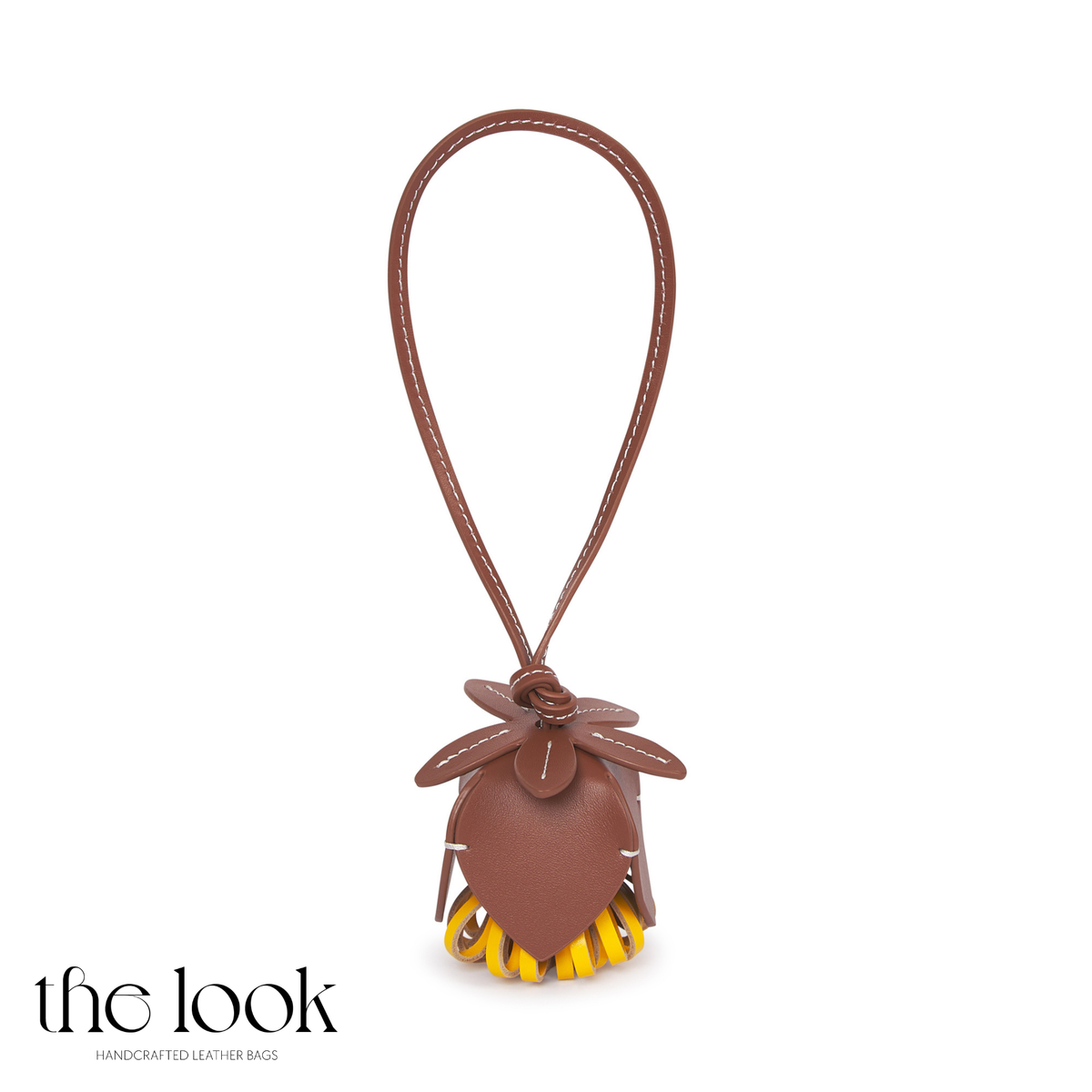 Florette Leather Bag Charm in Gold Tan | The Look Officiel