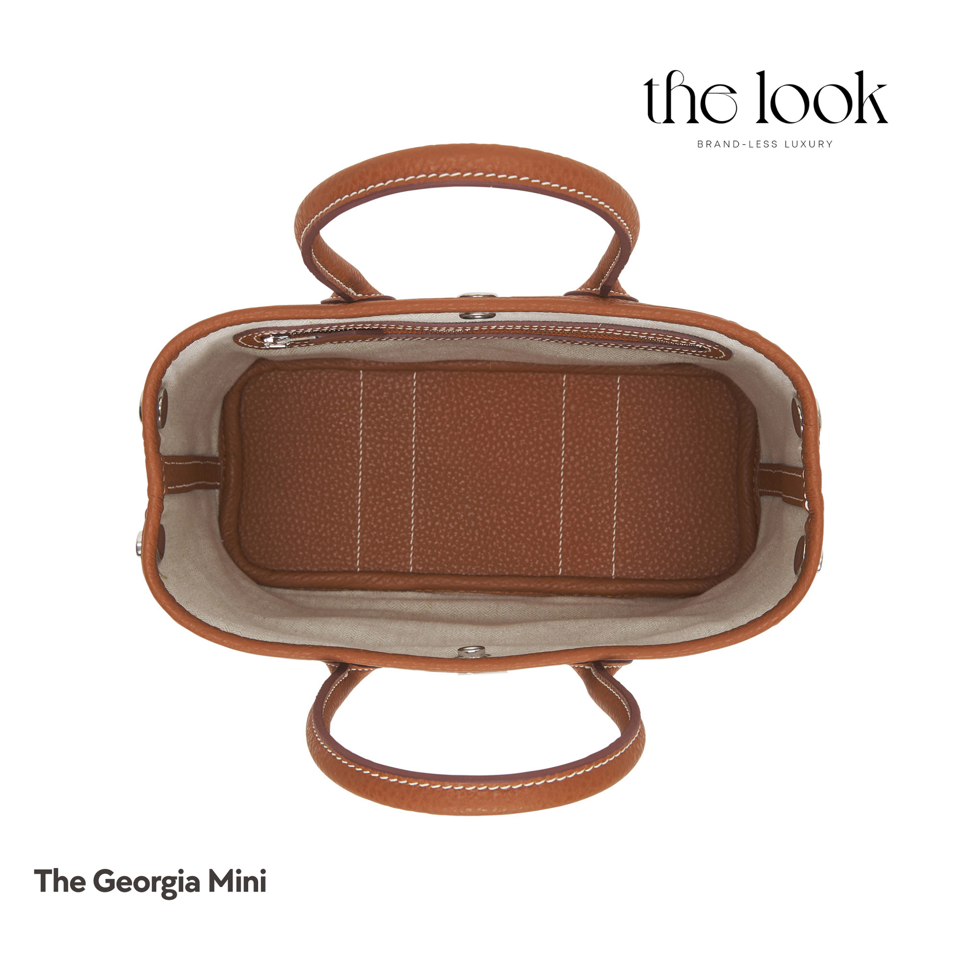 Open view of Georgia Mini Tote in Gold Tan Pebbled Calfskin Leather with zipper pocket