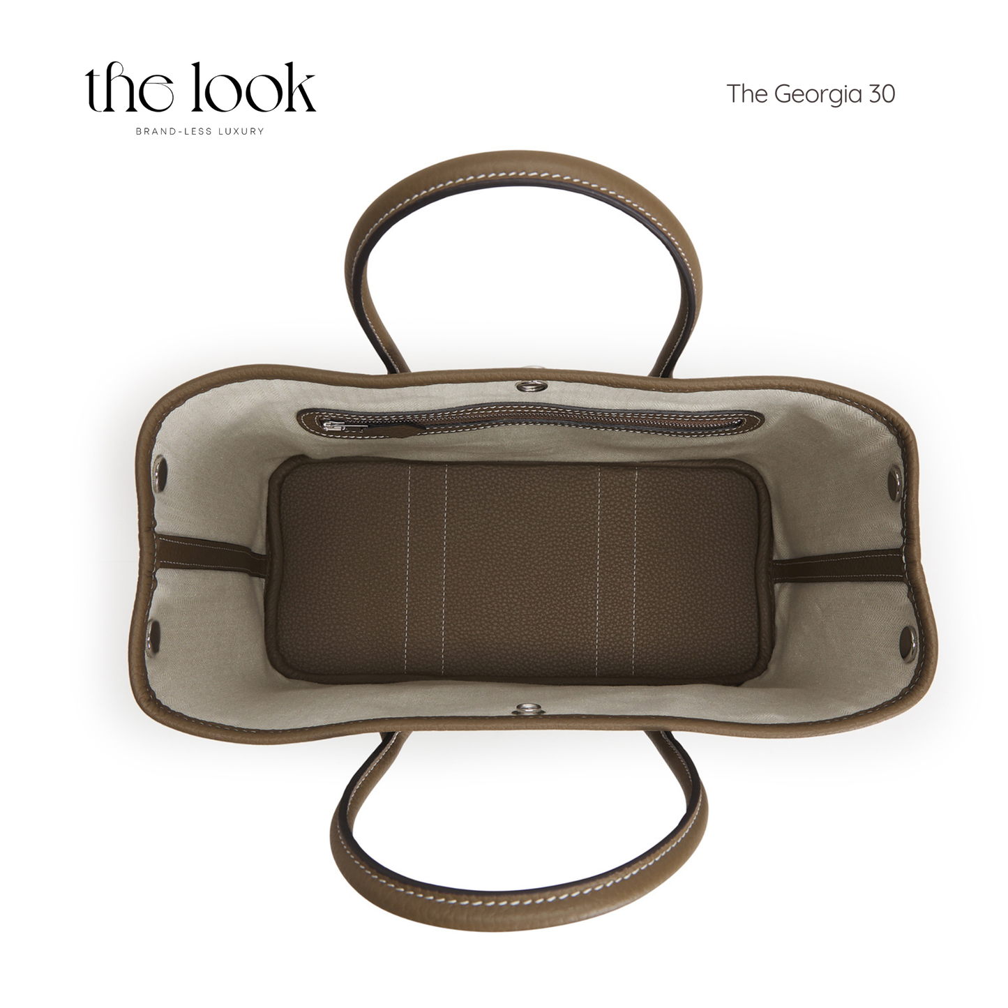 Brown handbag with visible interior on a white background, featuring 'the look' branding. | The Look Officiel