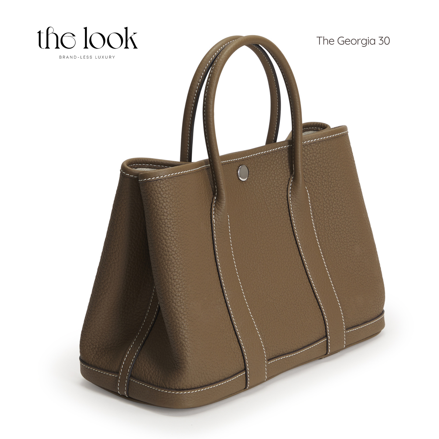 Brown handbag with visible stitching on a white background, branded 'the look'. | The Look Officiel