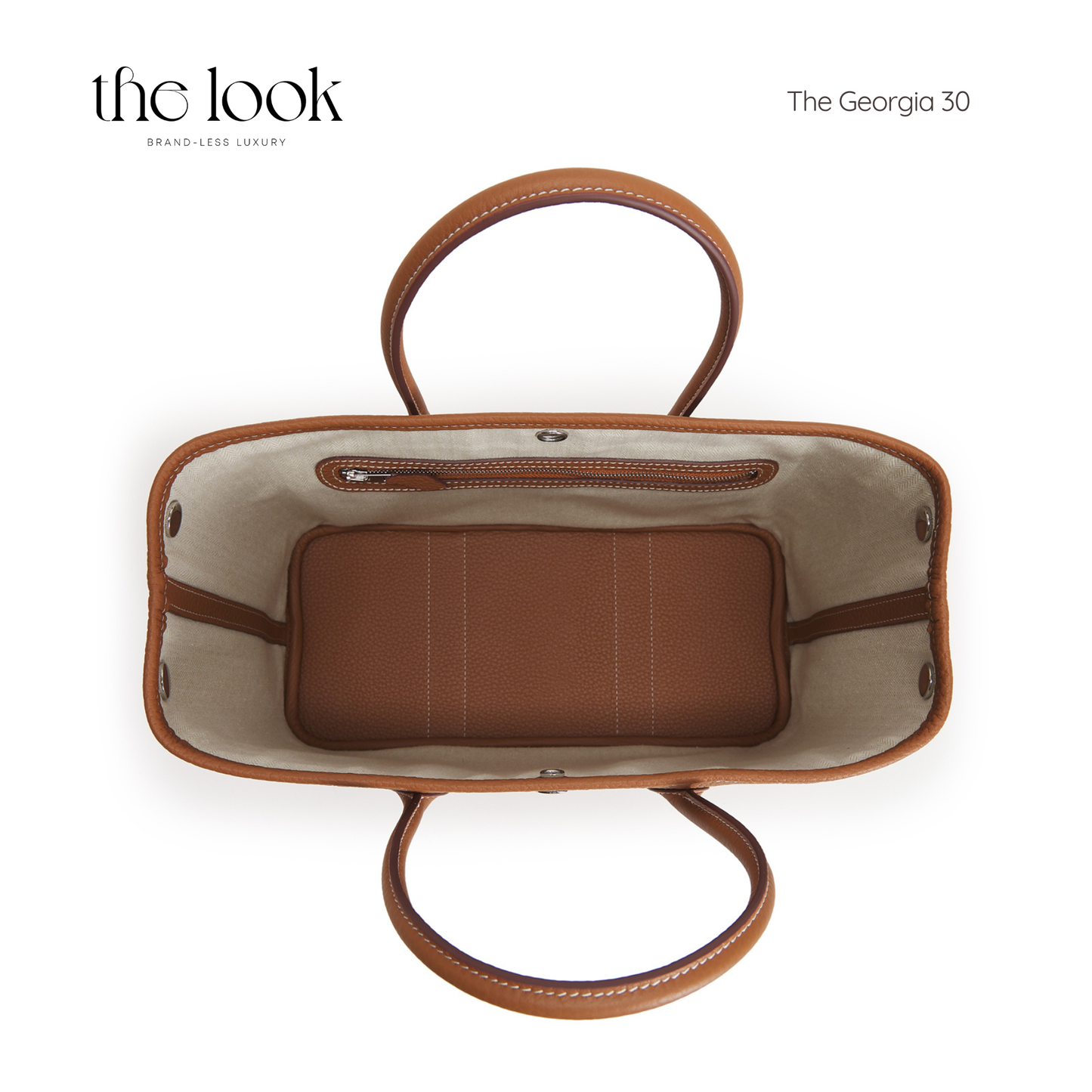 Brown handbag with leather interior on a white background, featuring 'the look' brand. | The Look Officiel