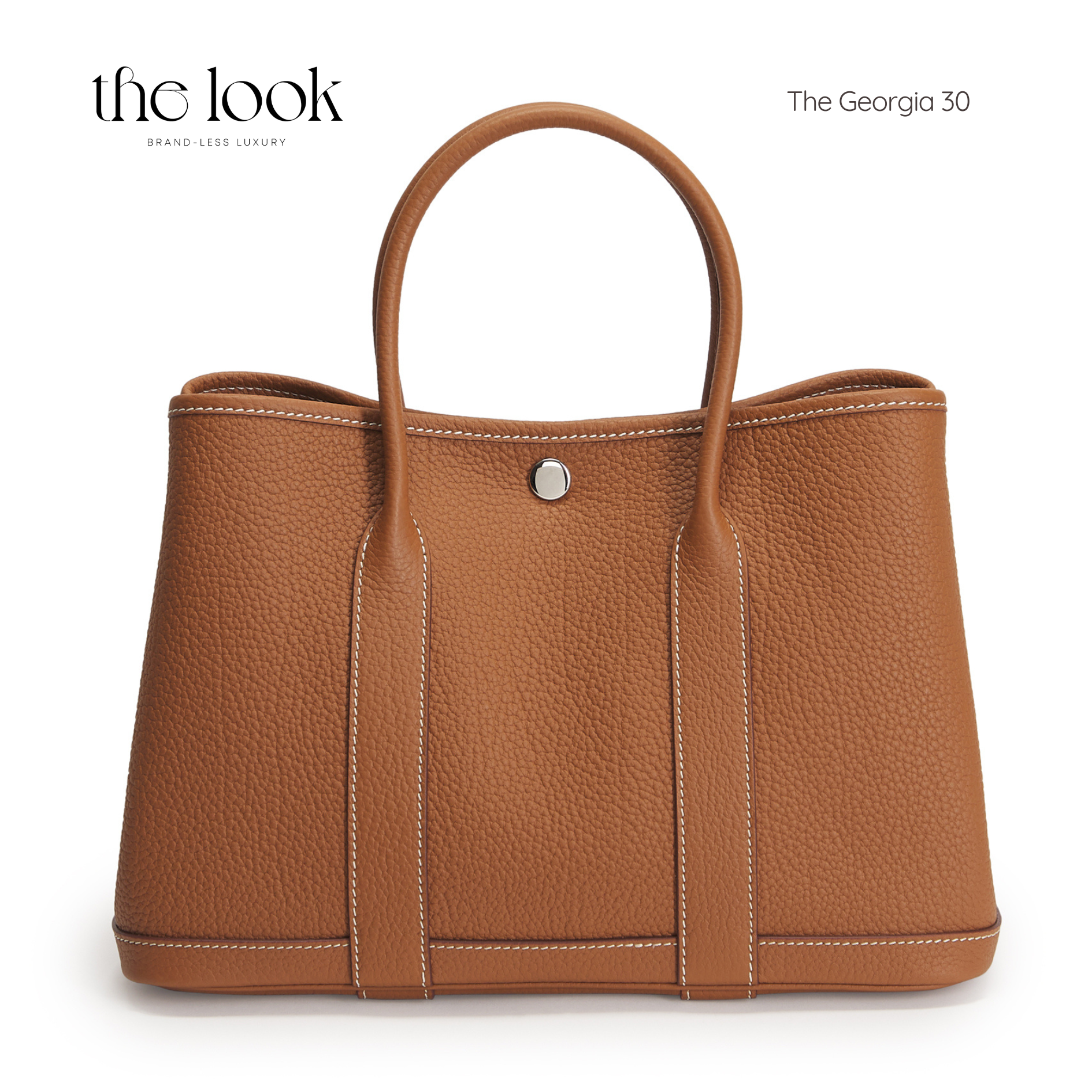 Brown leather handbag with visible brand name on a white background | The Look Officiel