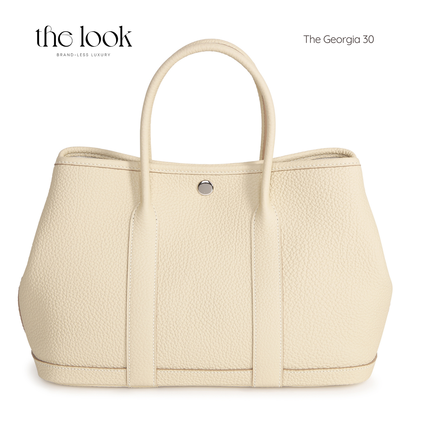 Beige handbag with a silver clasp on a white background, featuring 'the look' branding. | The Look Officiel