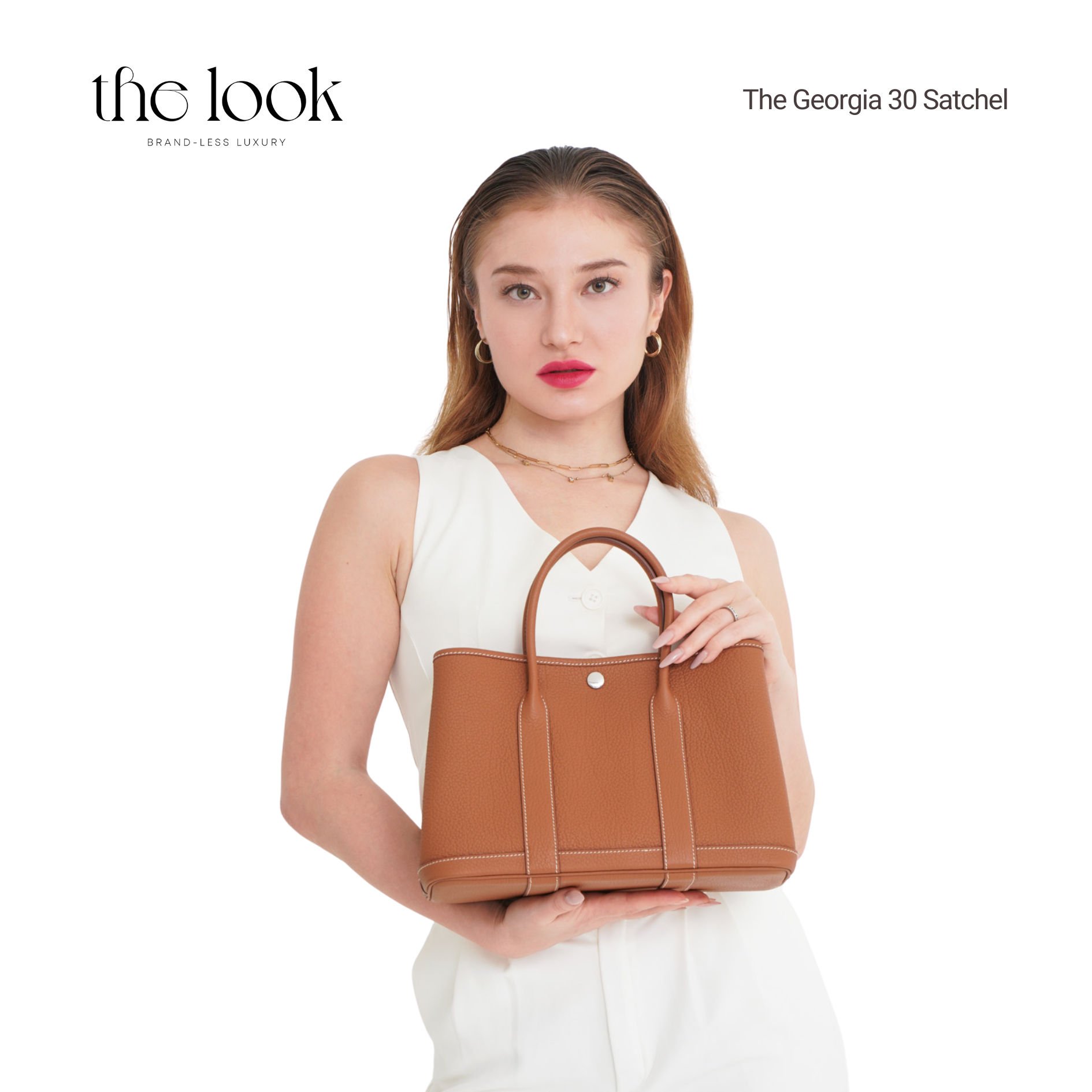 Woman holding a brown handbag with 'the look' branding on a white background | The Look Officiel