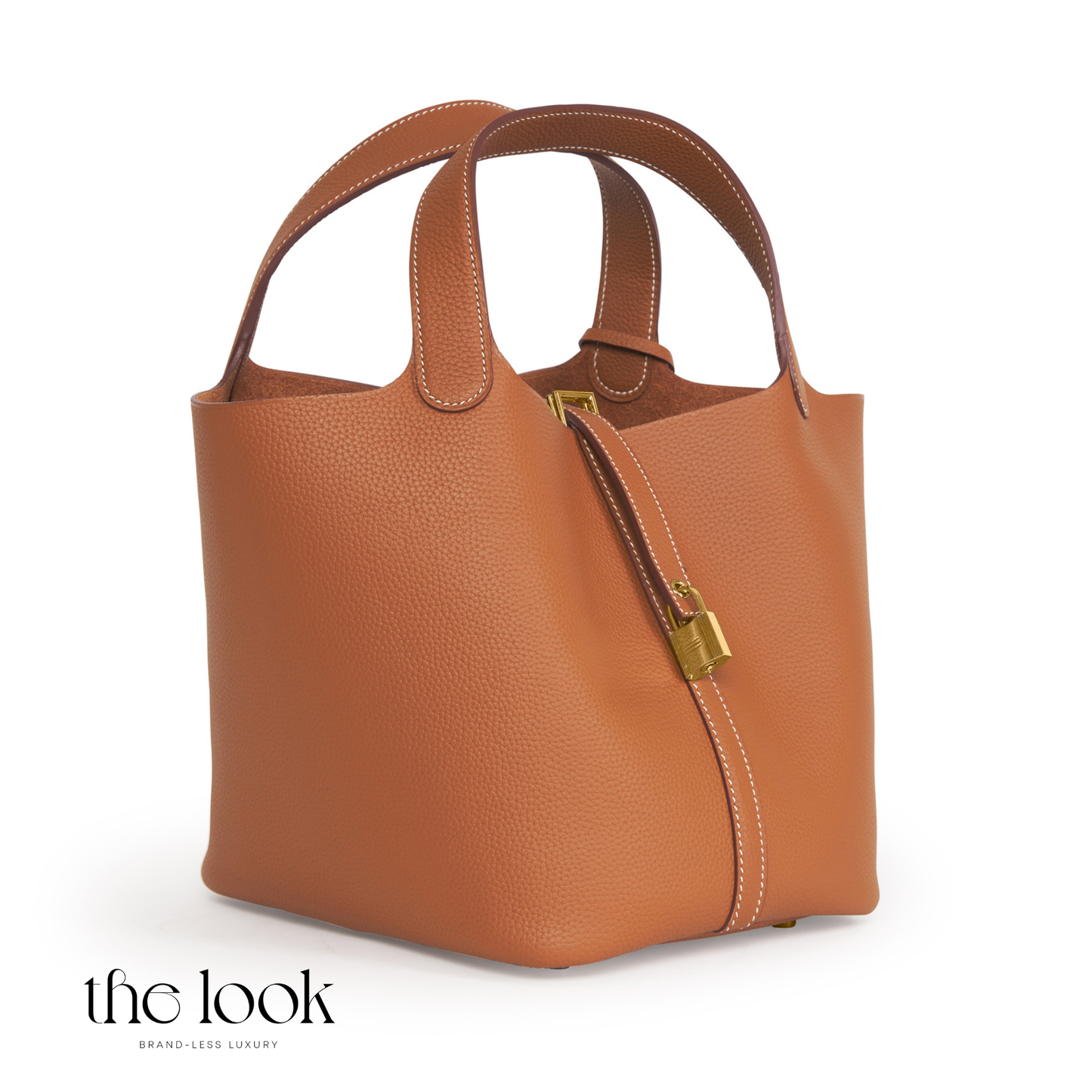 Brown leather handbag with gold hardware on a white background, featuring 'the look' brand. | The Look Officiel