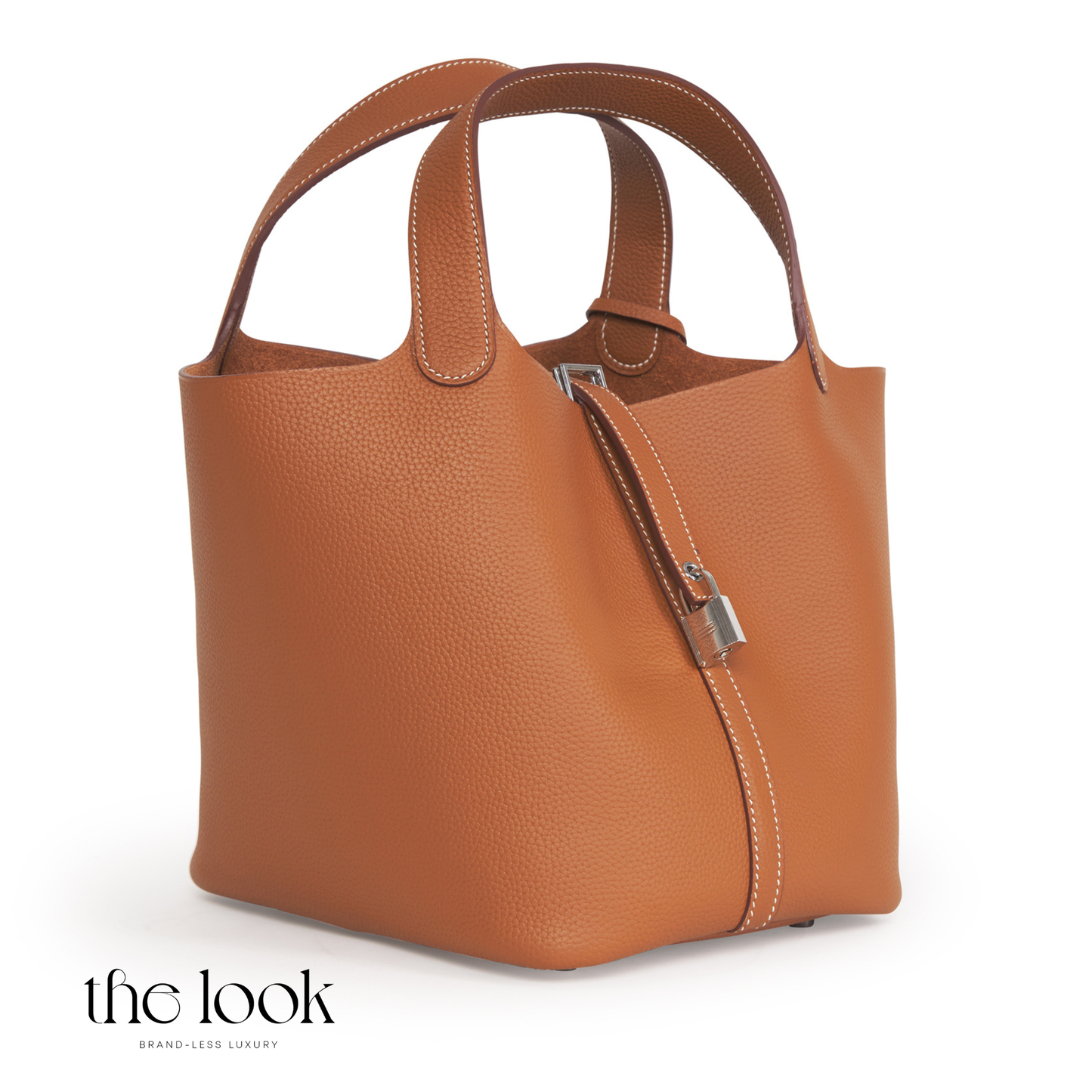 Brown leather handbag on a white background with 'the look' branding. | The Look Officiel