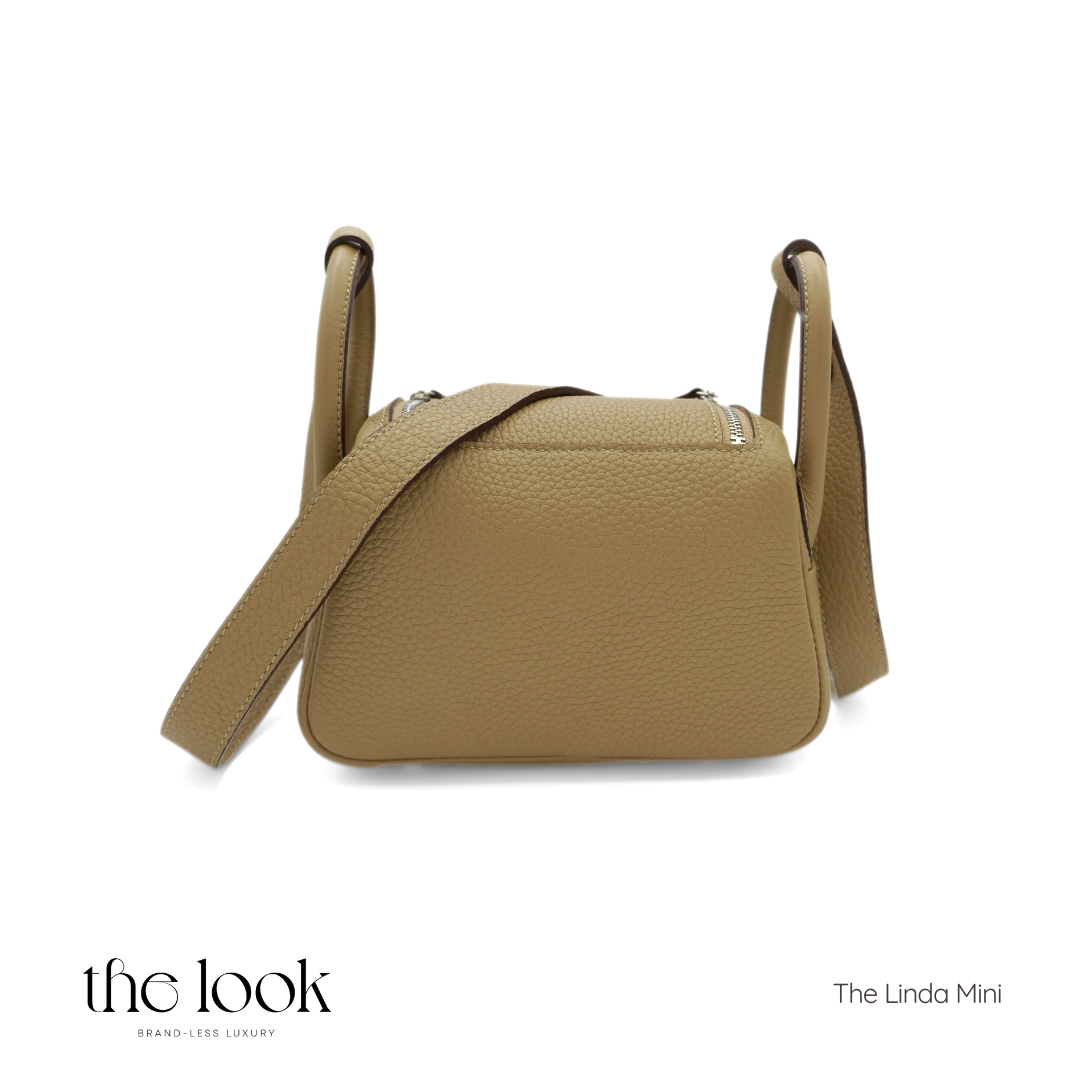 The Linda Mini Togo Leather in Biscuit SHW by The Look