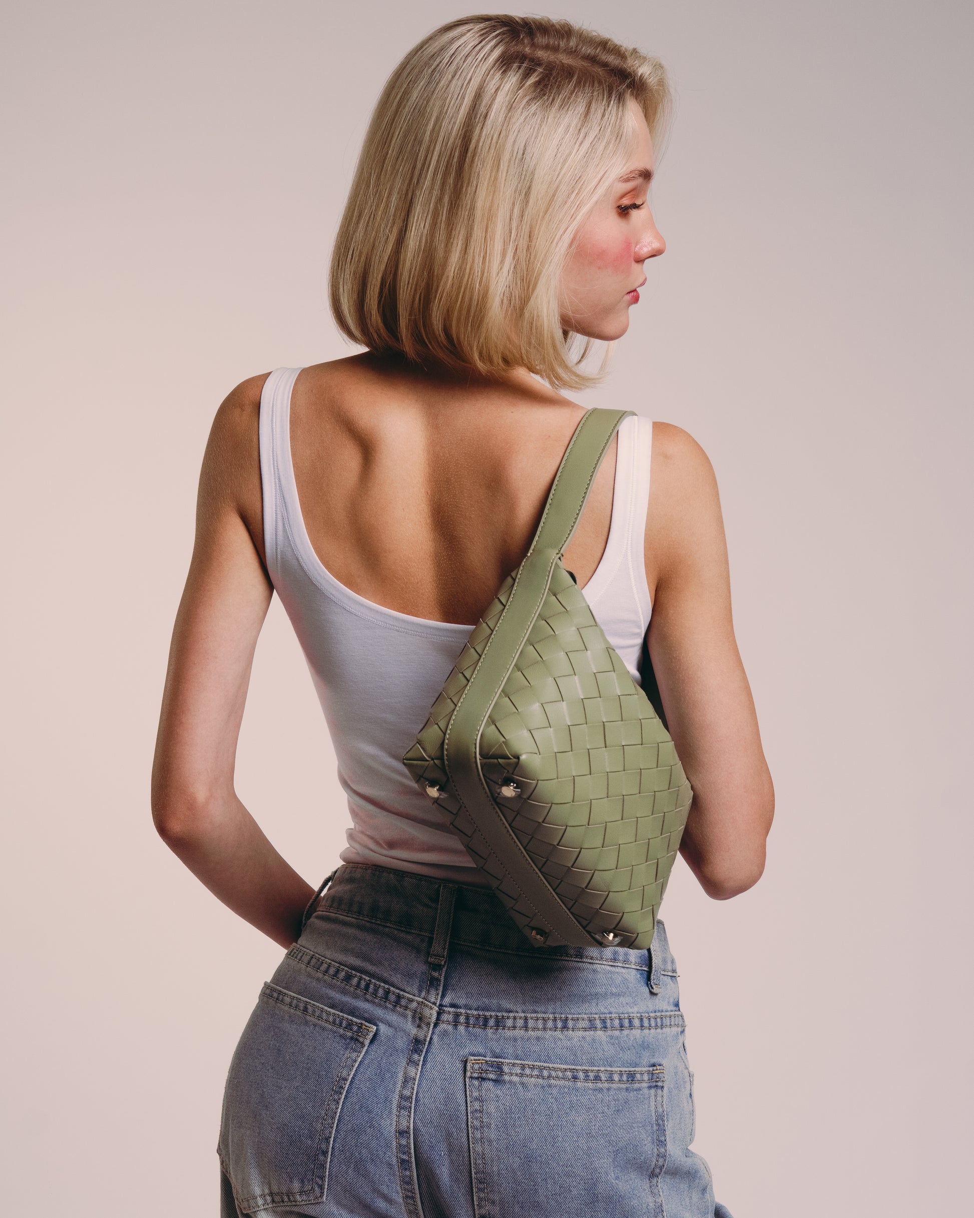 Girl Loop Mini convertible shoulder bag travertine lambskin woven knotted strap gold-tone hardware over shoulder