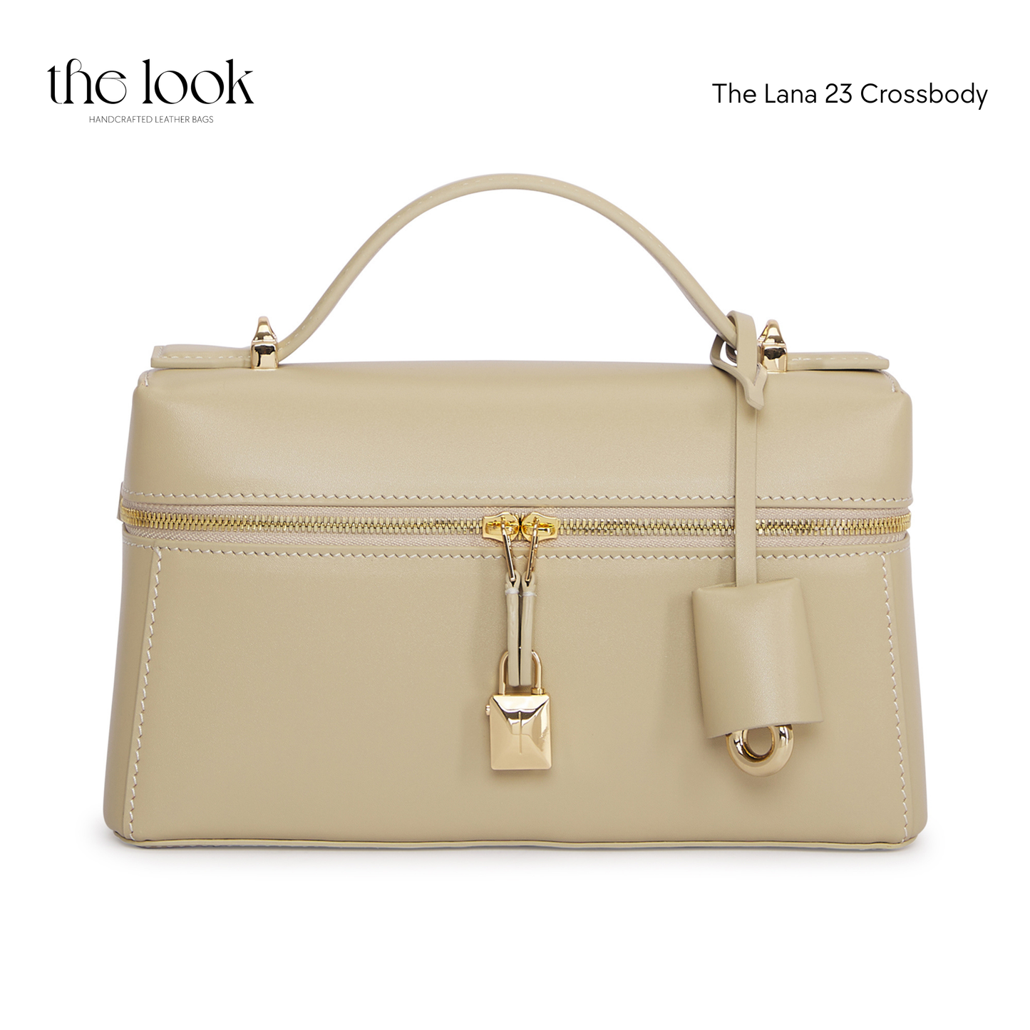 Beige crossbody bag with gold accents on a white background | The Look Officiel
