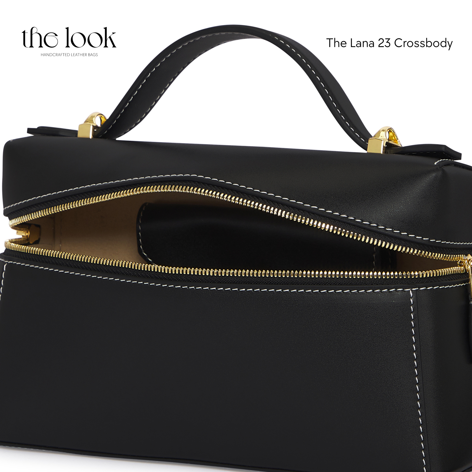 Black crossbody bag with gold zipper and handle on a white background, branded 'the look'. | The Look Officiel