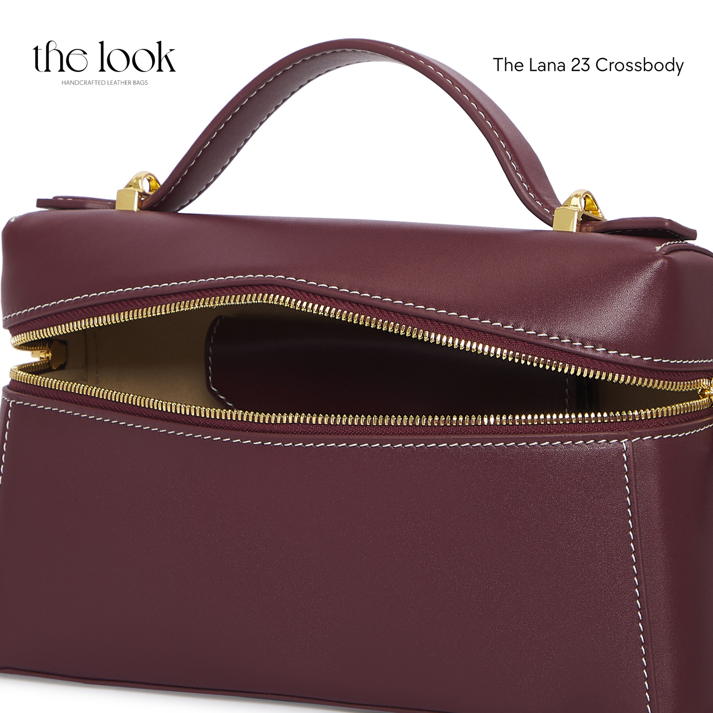 Maroon crossbody bag with gold zipper and hardware on a white background | The Look Officiel