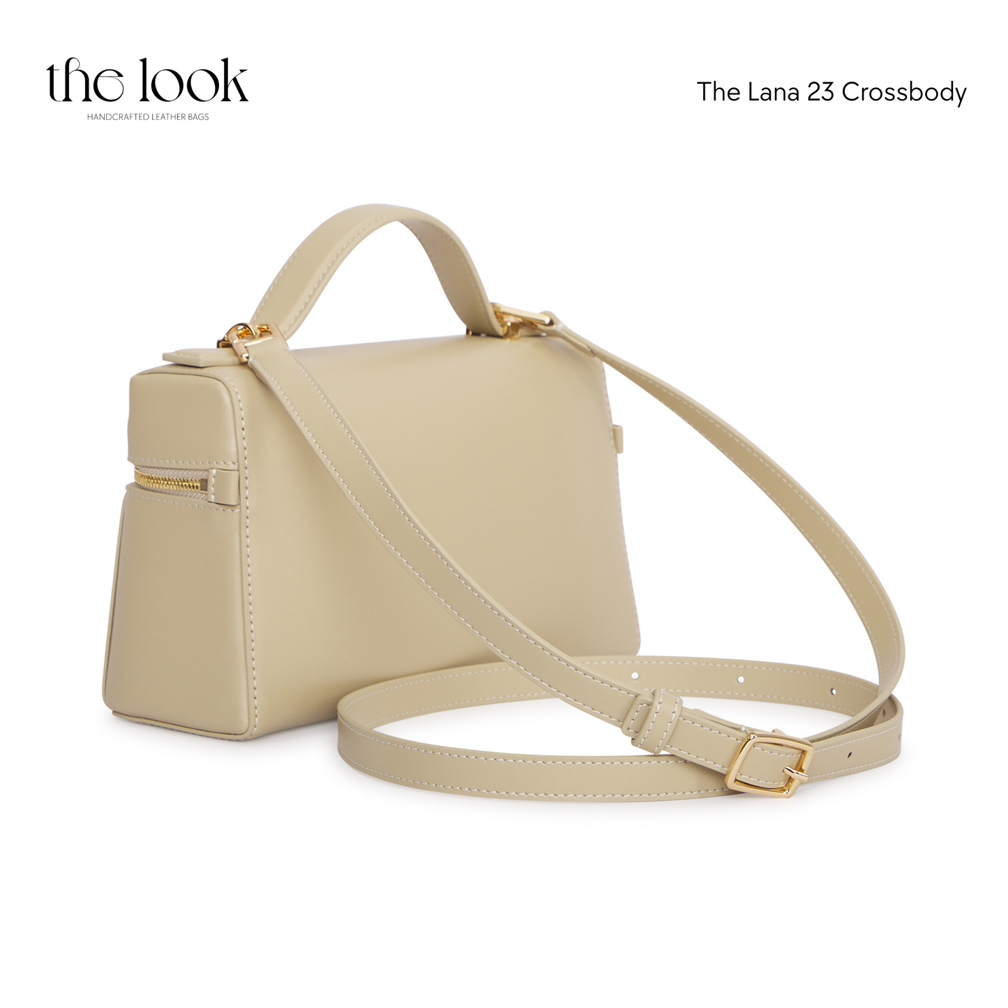 Beige crossbody bag with gold accents on a white background | The Look Officiel