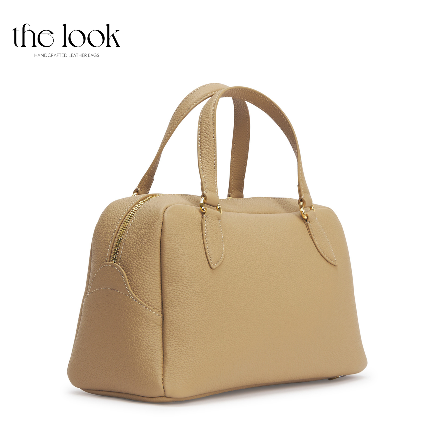 Beige handbag on a white background with 'the look' branding. | The Look Officiel