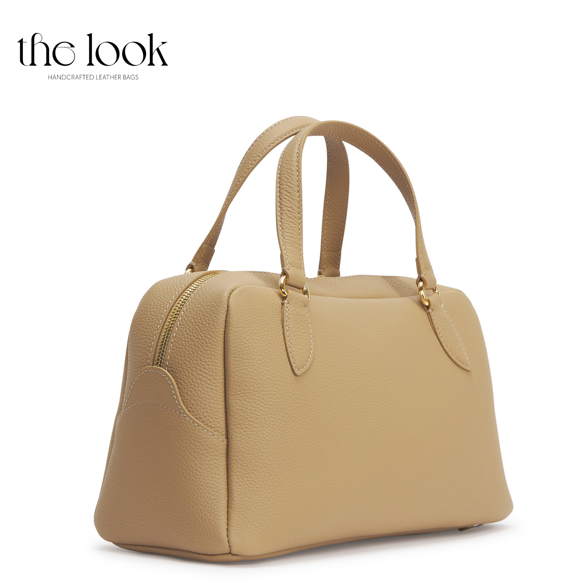 Beige handbag on a white background with 'the look' branding. | The Look Officiel