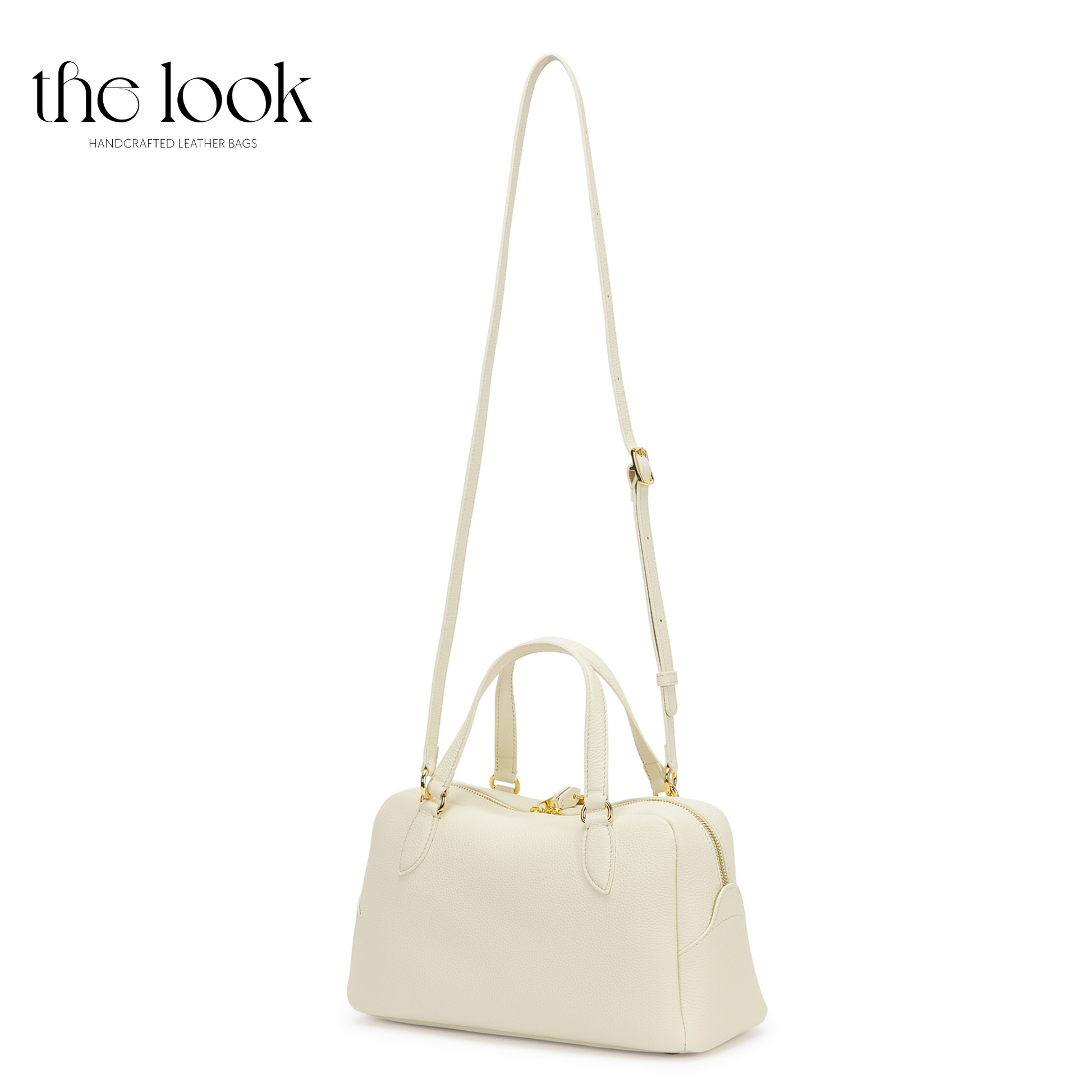 White handbag with a strap on a white background, branded 'the look'. | The Look Officiel
