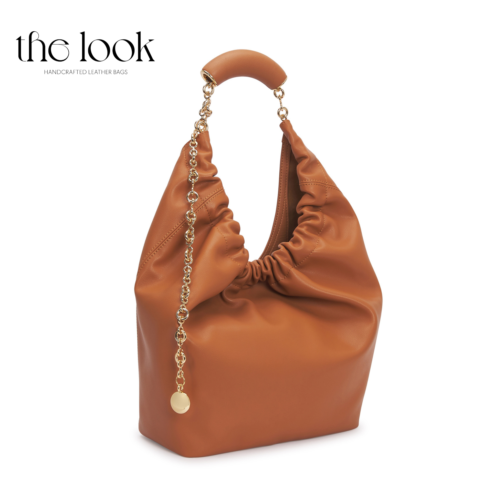 Brown leather handbag with chain detail on a white background, branded 'the look'. | The Look Officiel