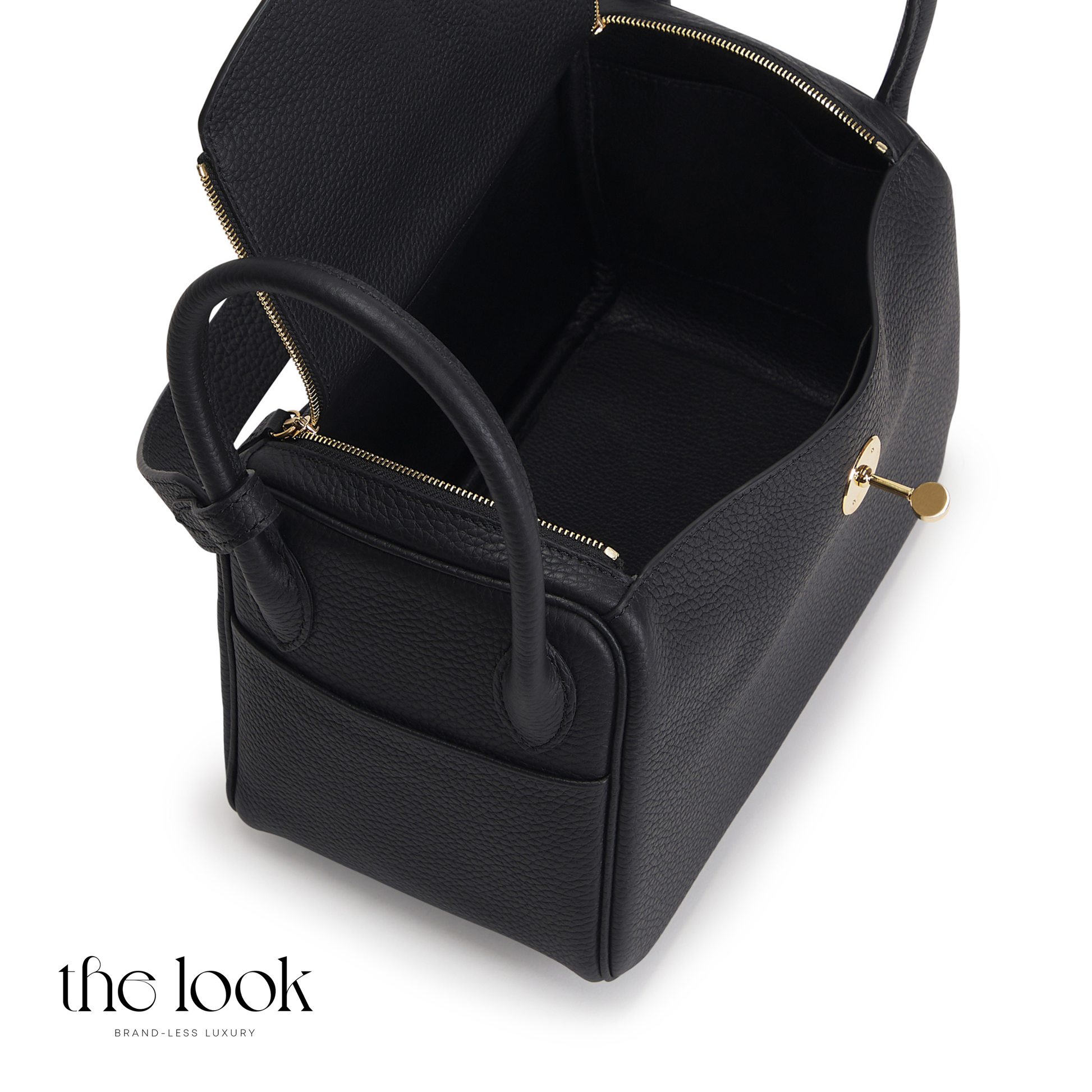 Black leather handbag with gold accents on a white background | The Look Officiel