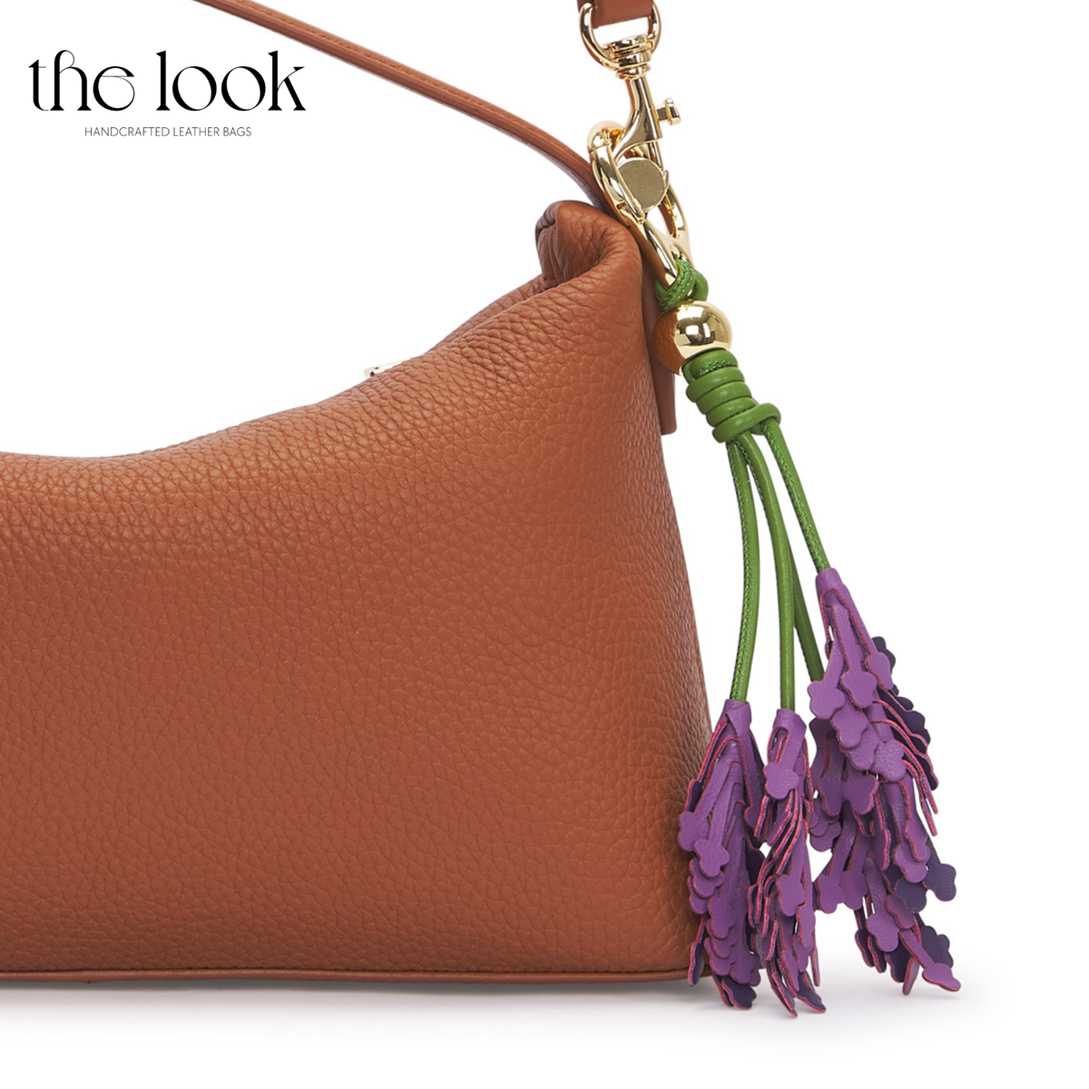 Lavender Leather Bag Charm on Gold Tan Handbag | The Look Officiel