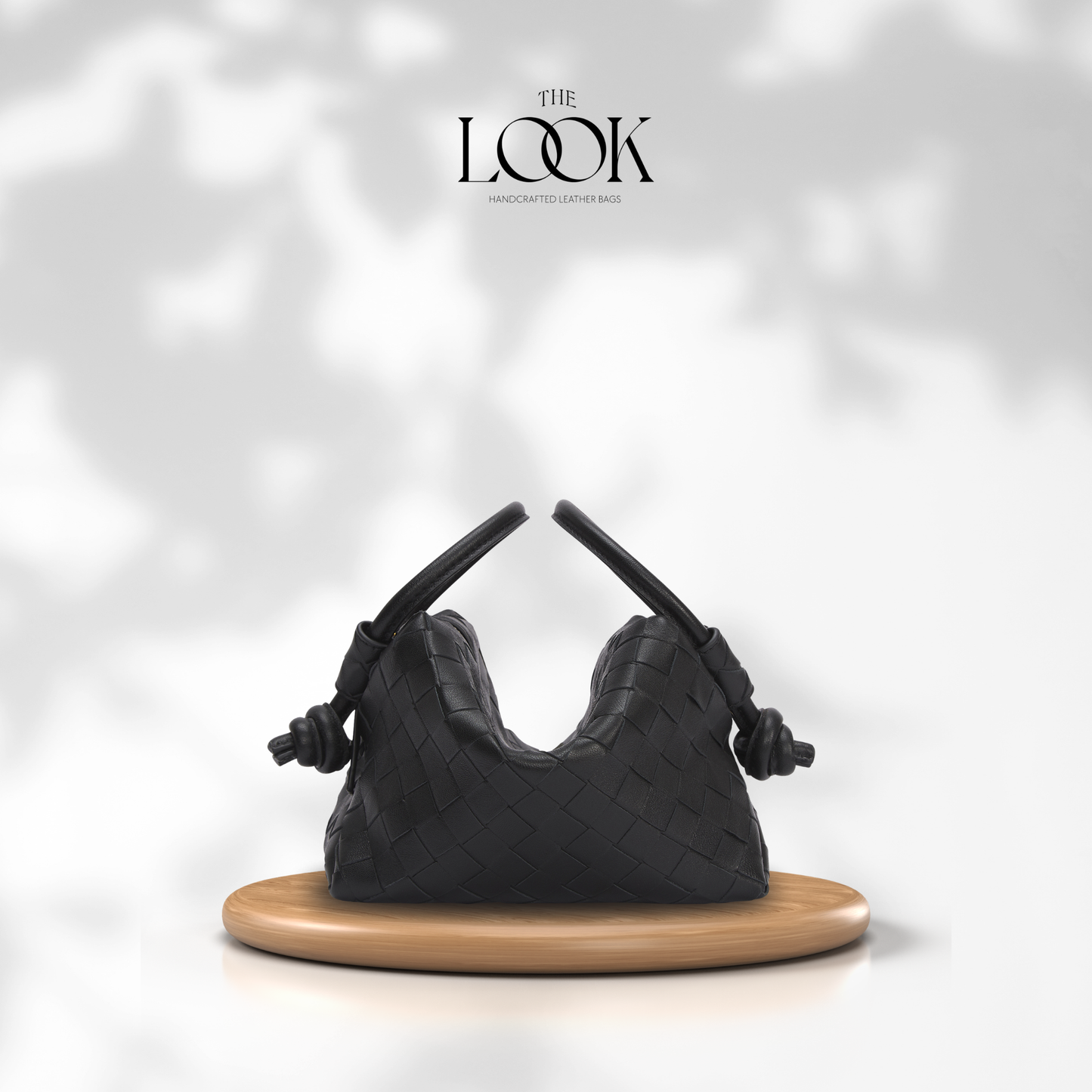 The Loop Two-Way Crossbody, Elité Edition — genuine leather handbag, side view | The Look Officiel