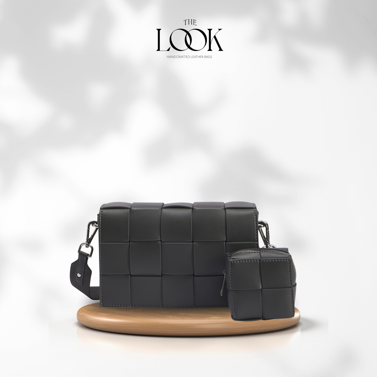 Gray Loop Grid Extra woven leather crossbody bag with matching removable zippered pouch | The Look Officiel