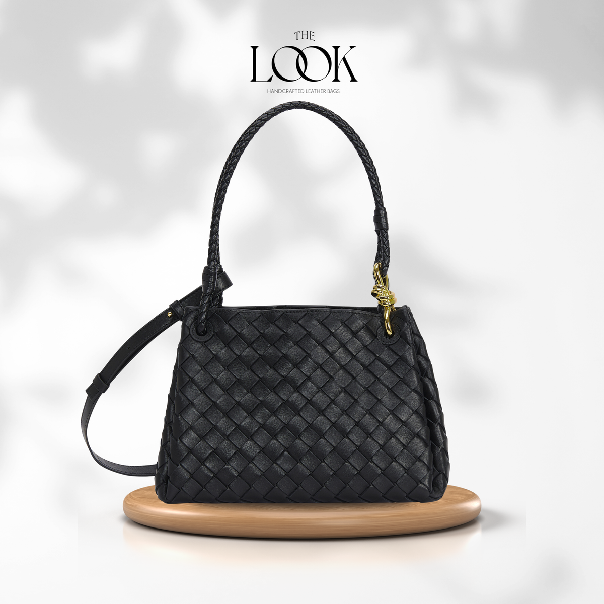 Black The Loop Medium Parachute Convertible Shoulder Bag woven lambskin leather shoulder bag with braided handle and gold-tone hardware | The Look Officiel