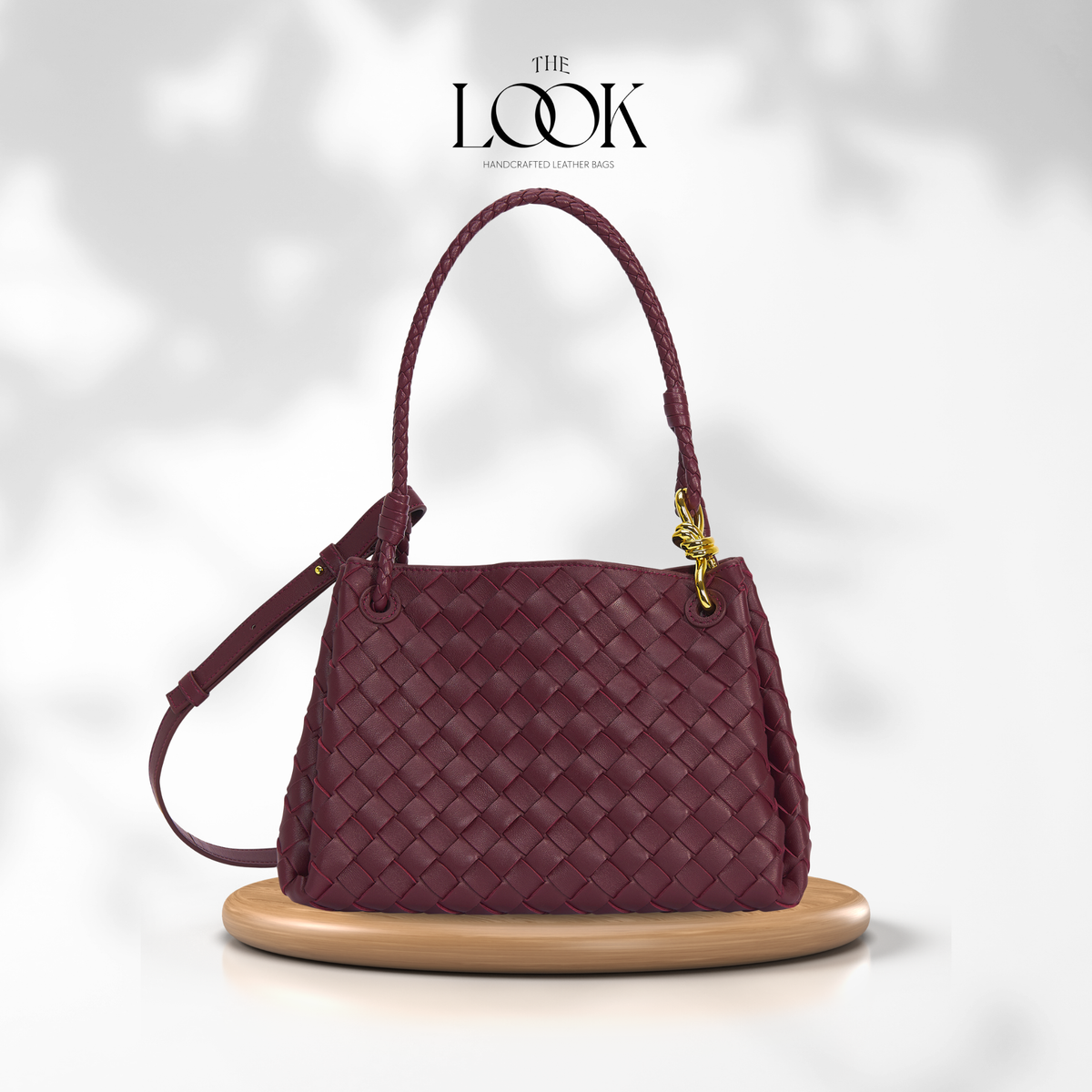 Burgundy The Loop Medium Parachute Convertible Shoulder Bag woven lambskin leather shoulder bag with braided handle and gold-tone hardware | The Look Officiel