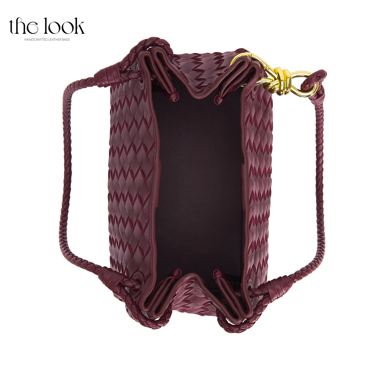 Burgundy The Loop Medium Parachute Convertible Shoulder Bag leather bag top view showing roomy main compartment and woven sides | The Look Officiel