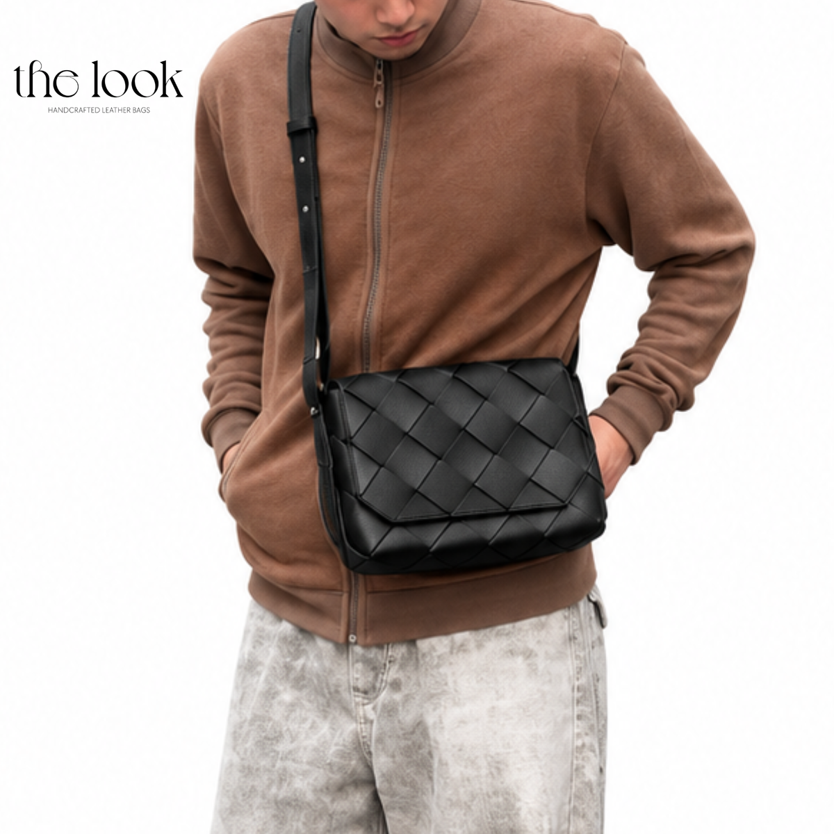 Man wearing black Loop Weave leather crossbody bag across a brown jacket with light denim jeans | The Look Officiel