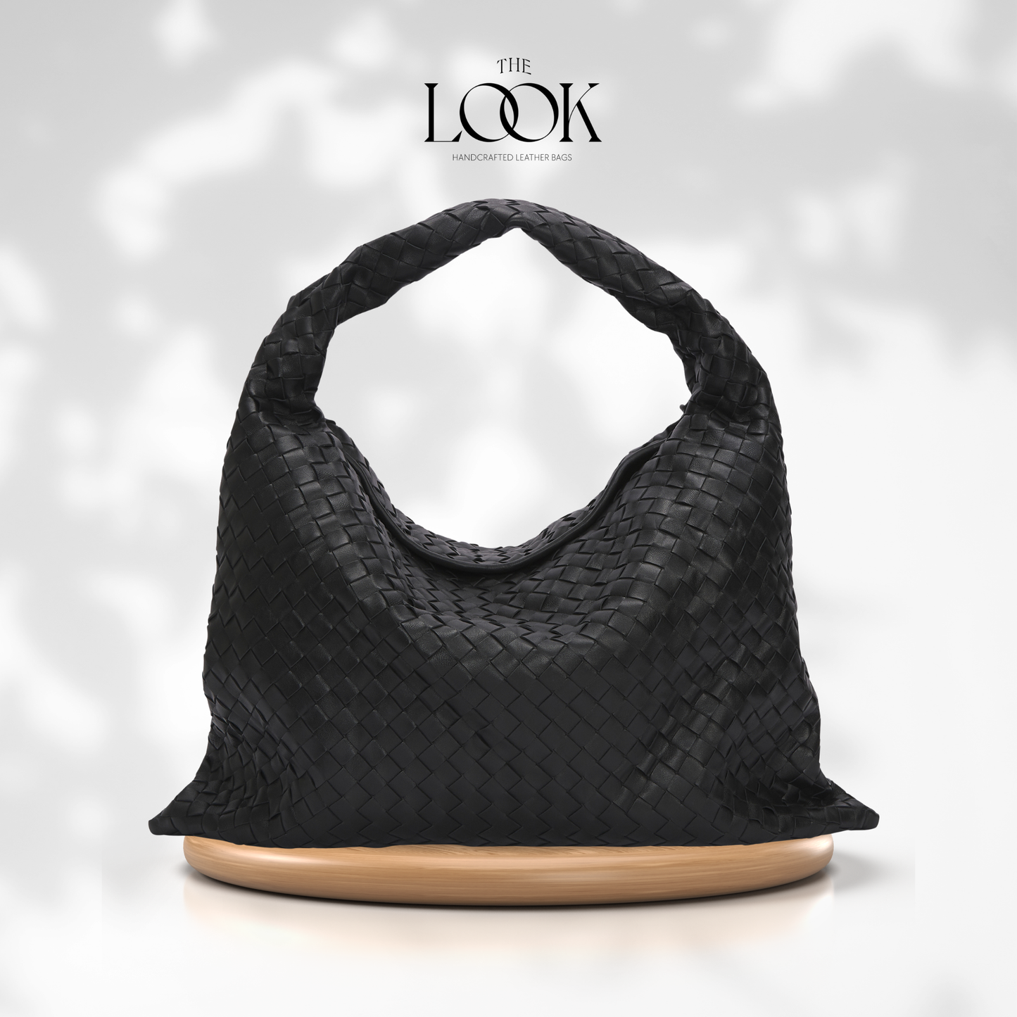 The Loop Maxi Shoulder Bag, Elité Edition — genuine leather handbag, side view | The Look Officiel