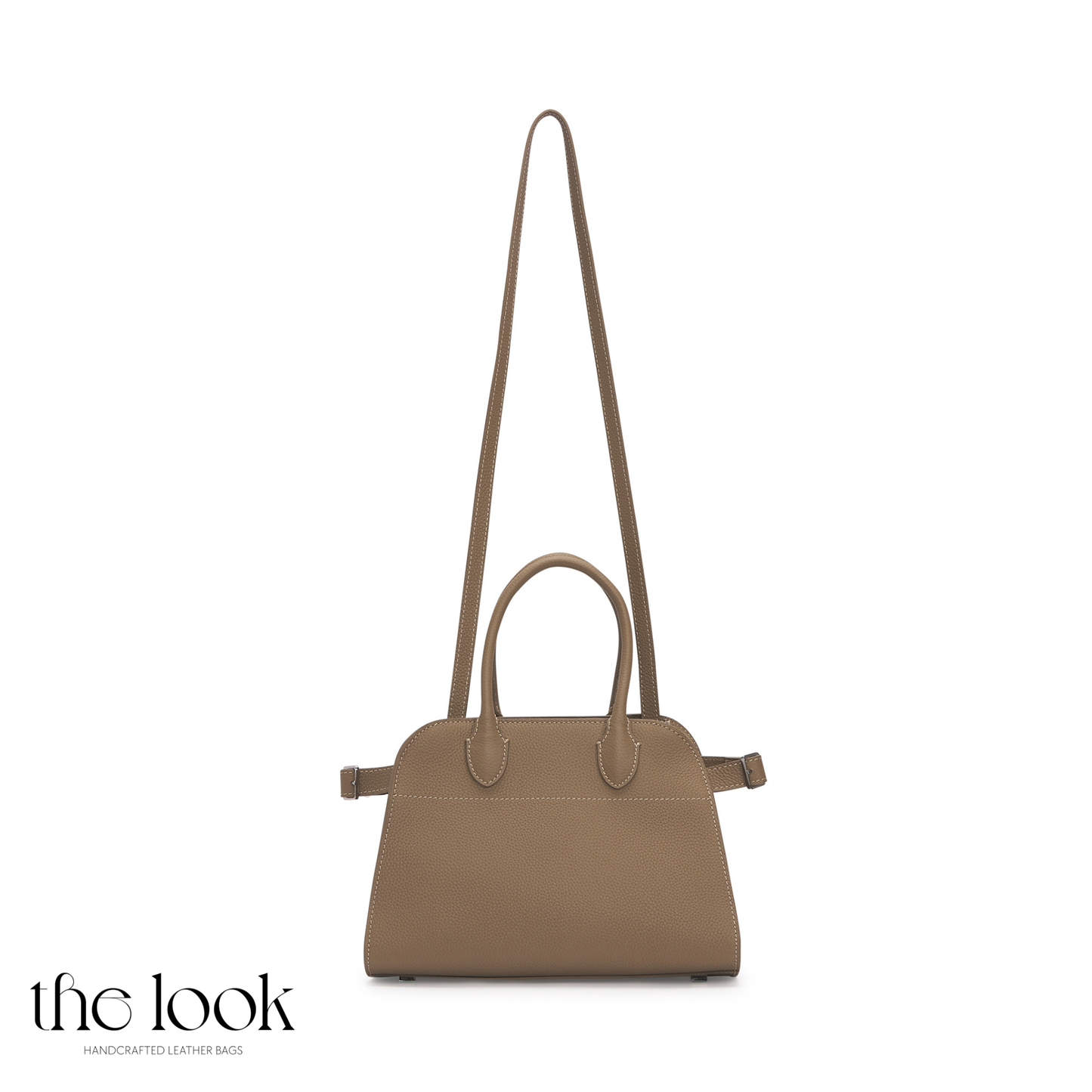 Beige handbag with a strap on a white background, branded 'the look'. | The Look Officiel