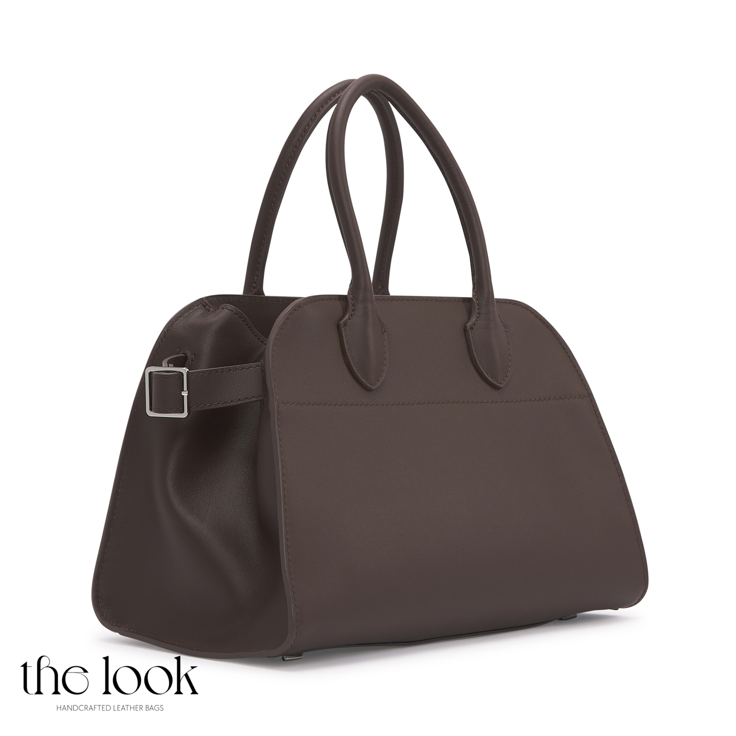 Brown handbag with a buckle on a white background, featuring 'the look' brand. | The Look Officiel