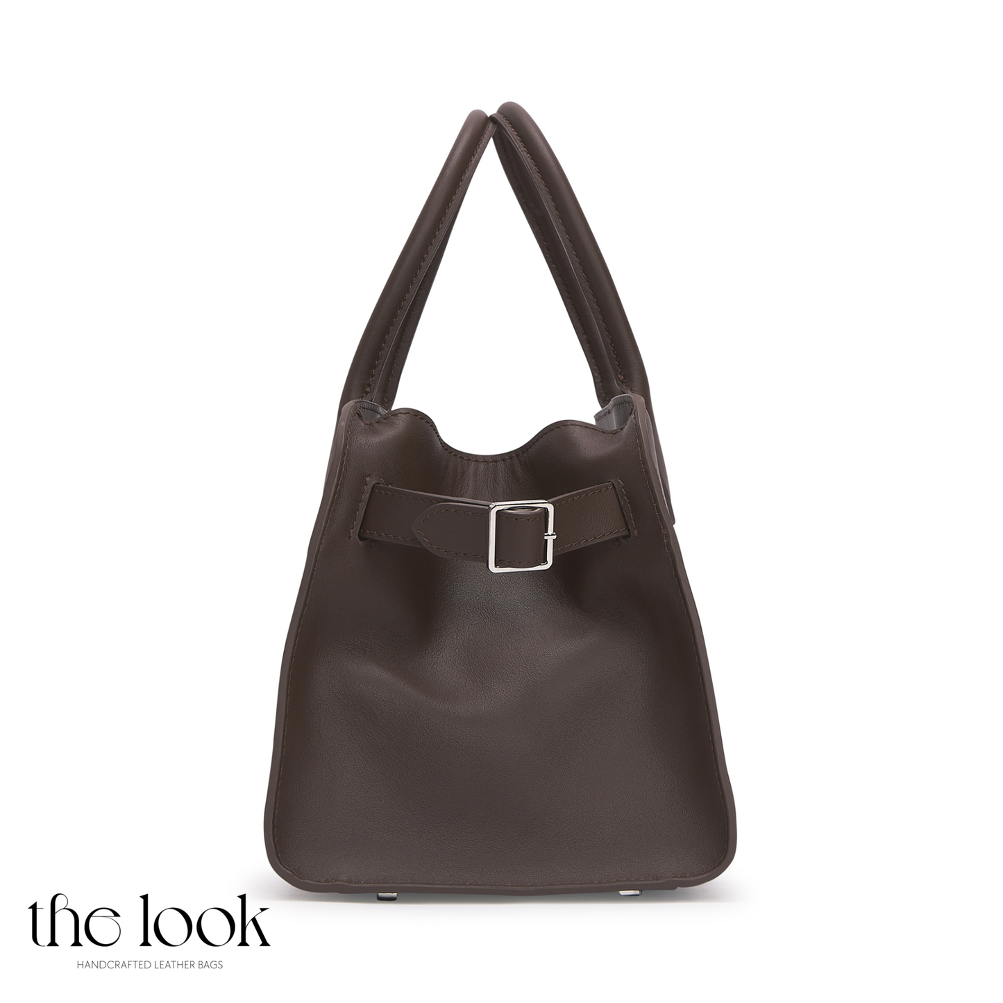 Brown leather handbag with a buckle on a white background, branded 'the look'. | The Look Officiel