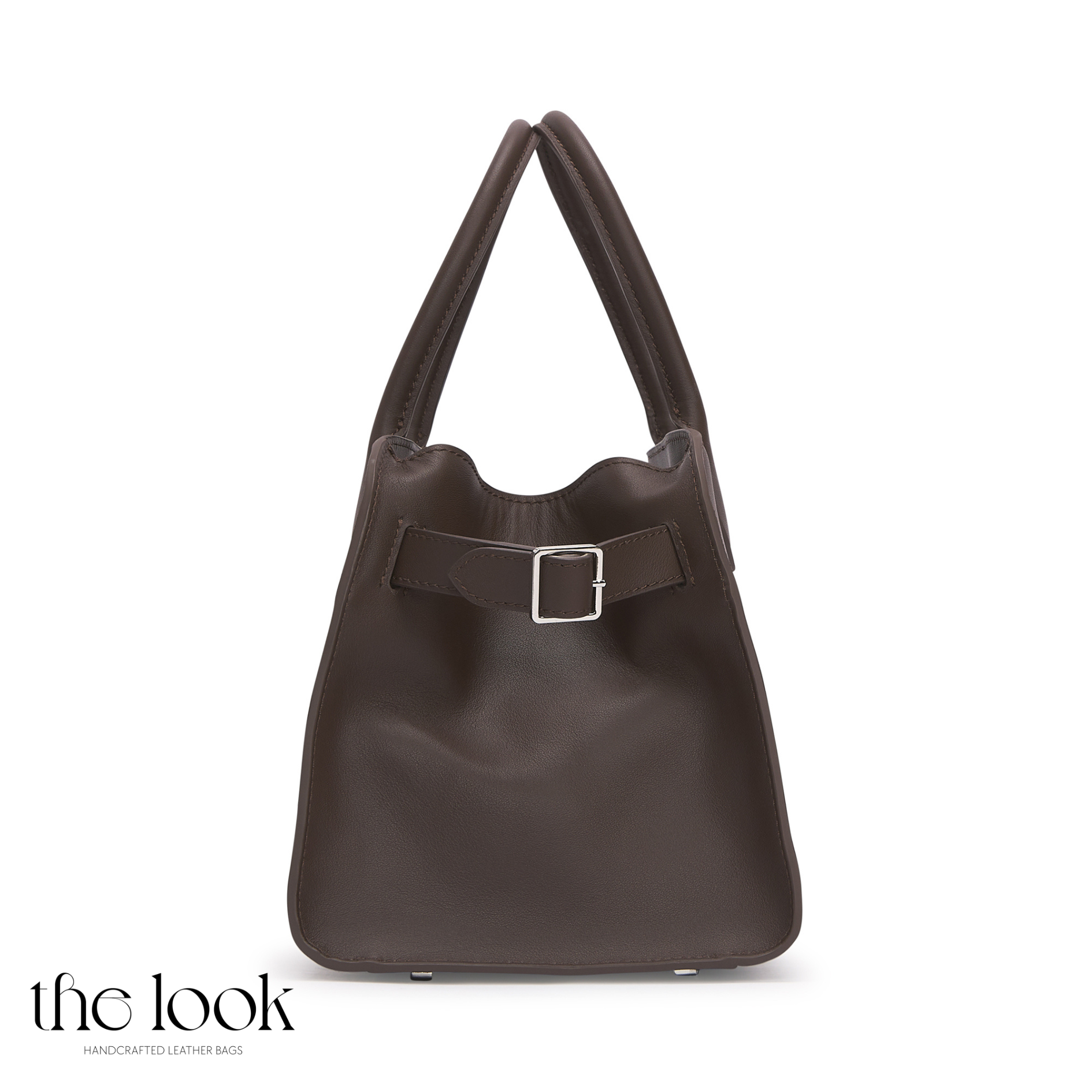 Brown leather handbag with a buckle on a white background, branded 'the look'. | The Look Officiel