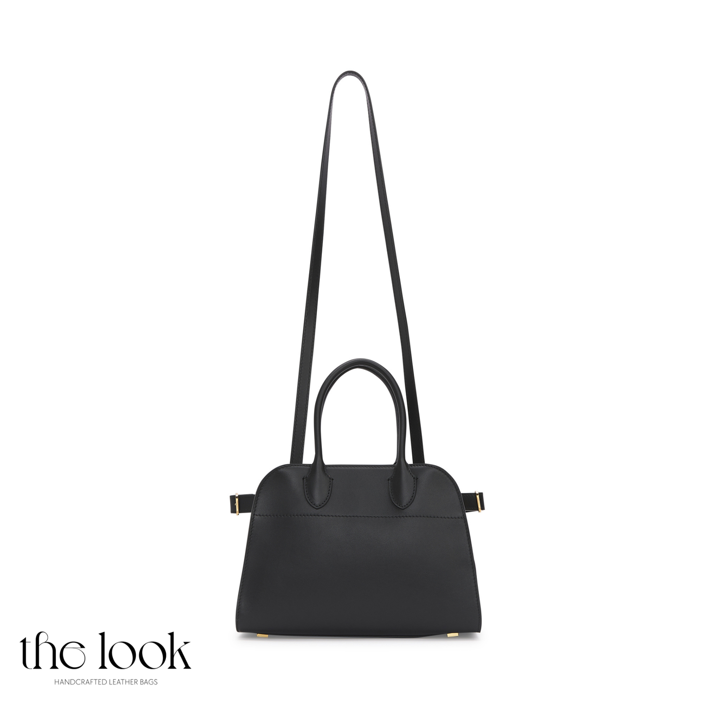 Black handbag with a long strap on a white background, featuring 'the look' brand. | The Look Officiel