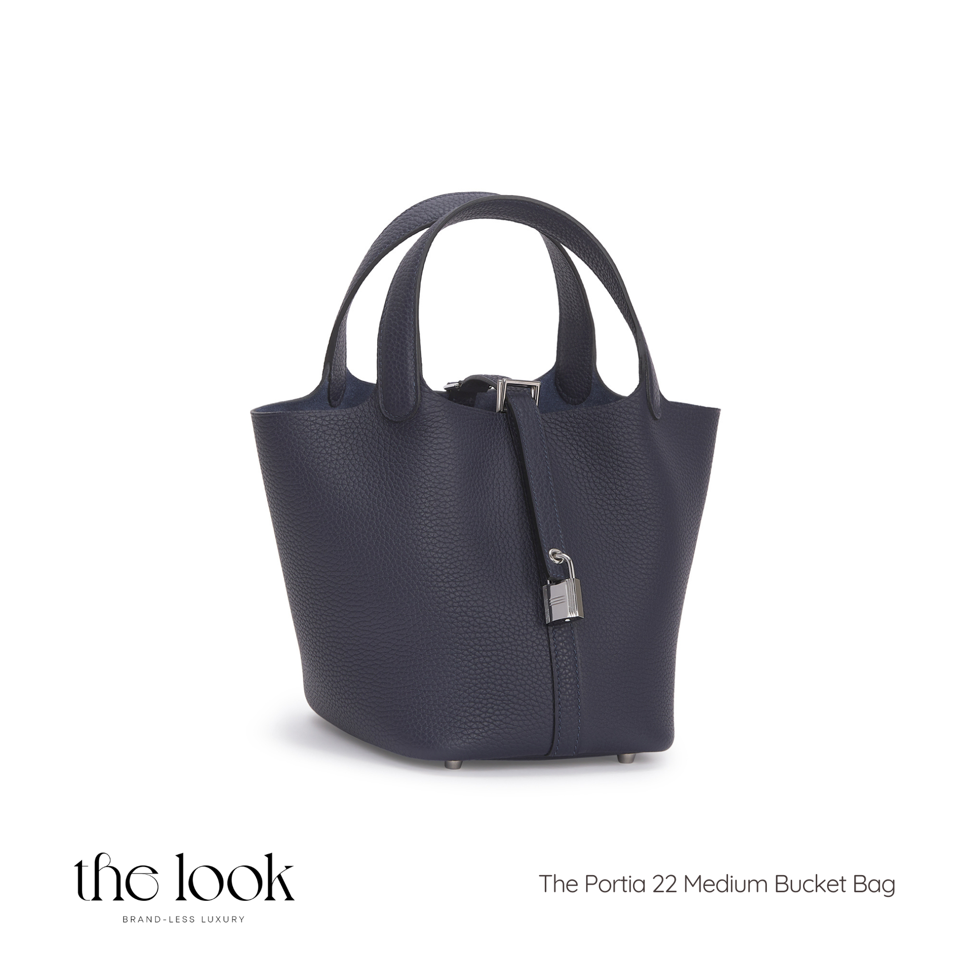 Navy blue handbag with a silver lock on a white background, branded 'the look'. | The Look Officiel