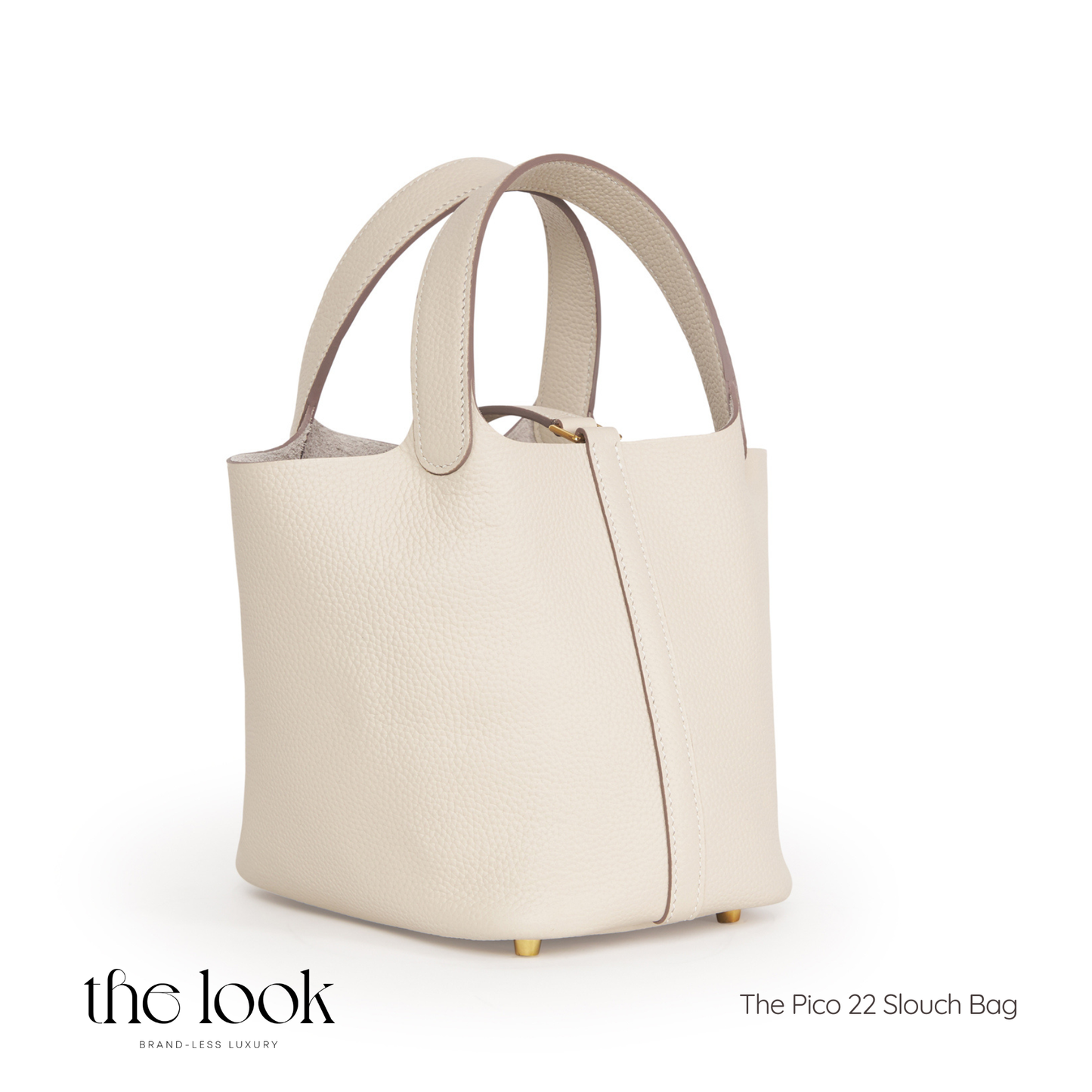 Beige handbag with gold accents on a white background, featuring 'the look' brand. | The Look Officiel