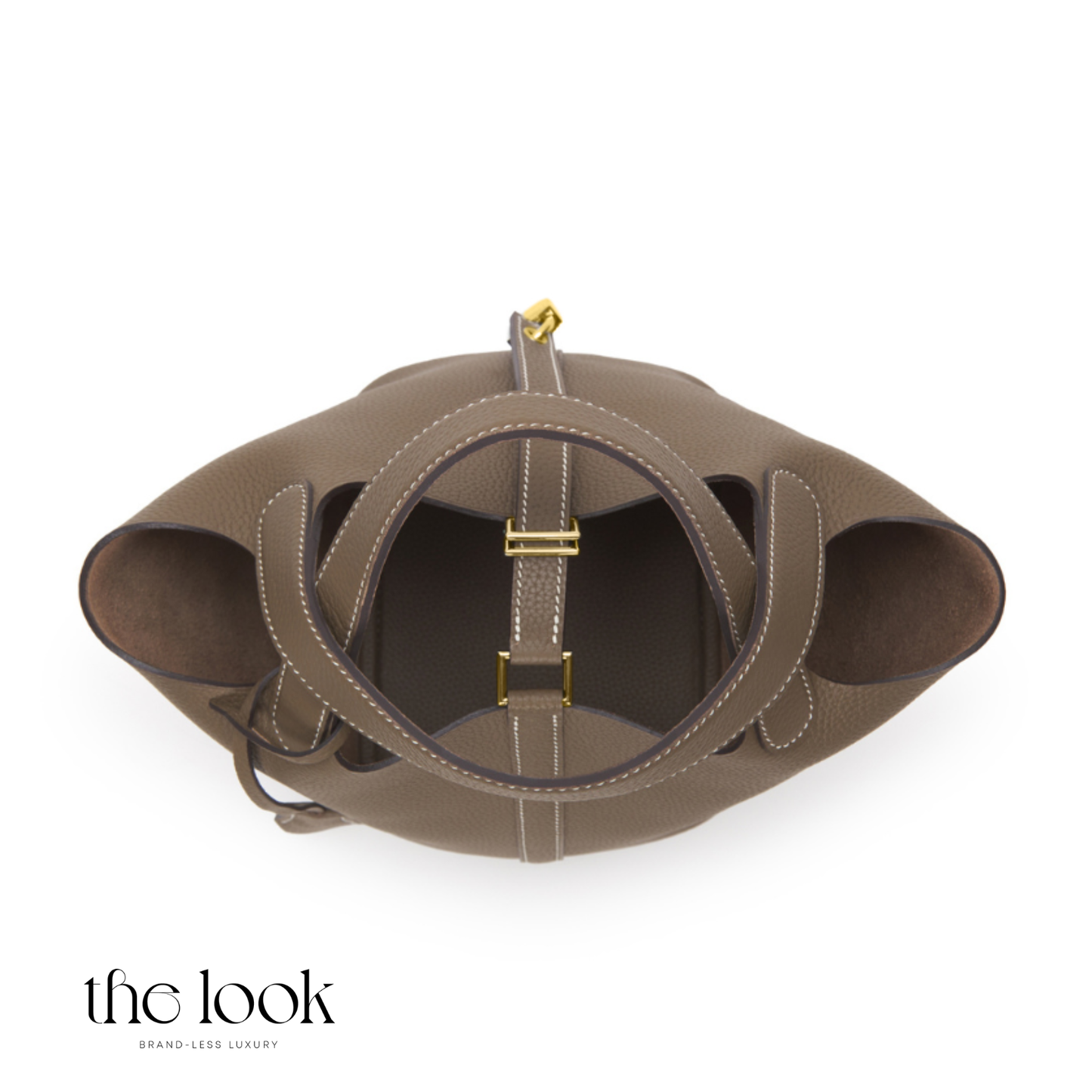 Brown leather handbag with gold accents on a white background, featuring 'the look' brand. | The Look Officiel