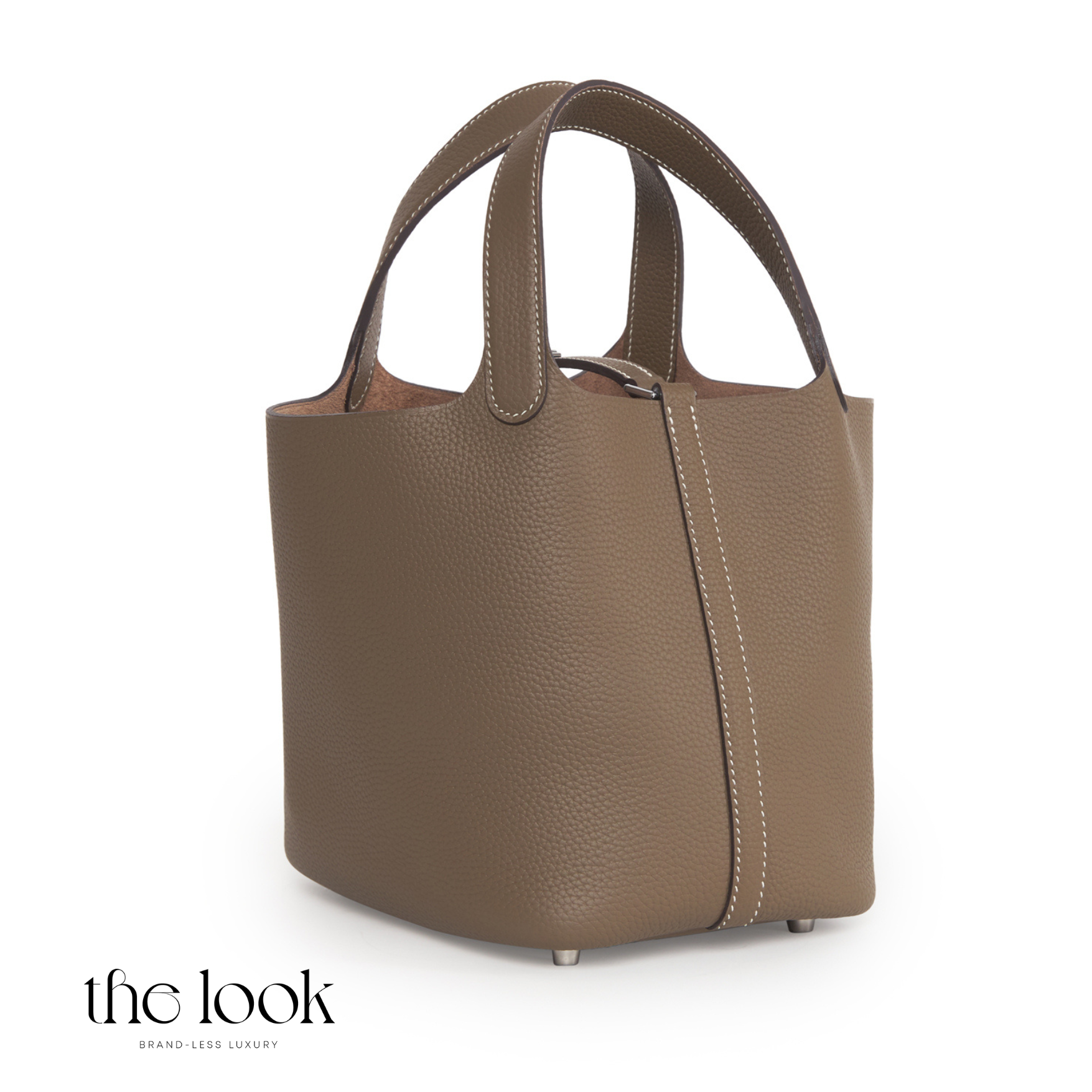Brown handbag on a white background with 'the look' branding. | The Look Officiel